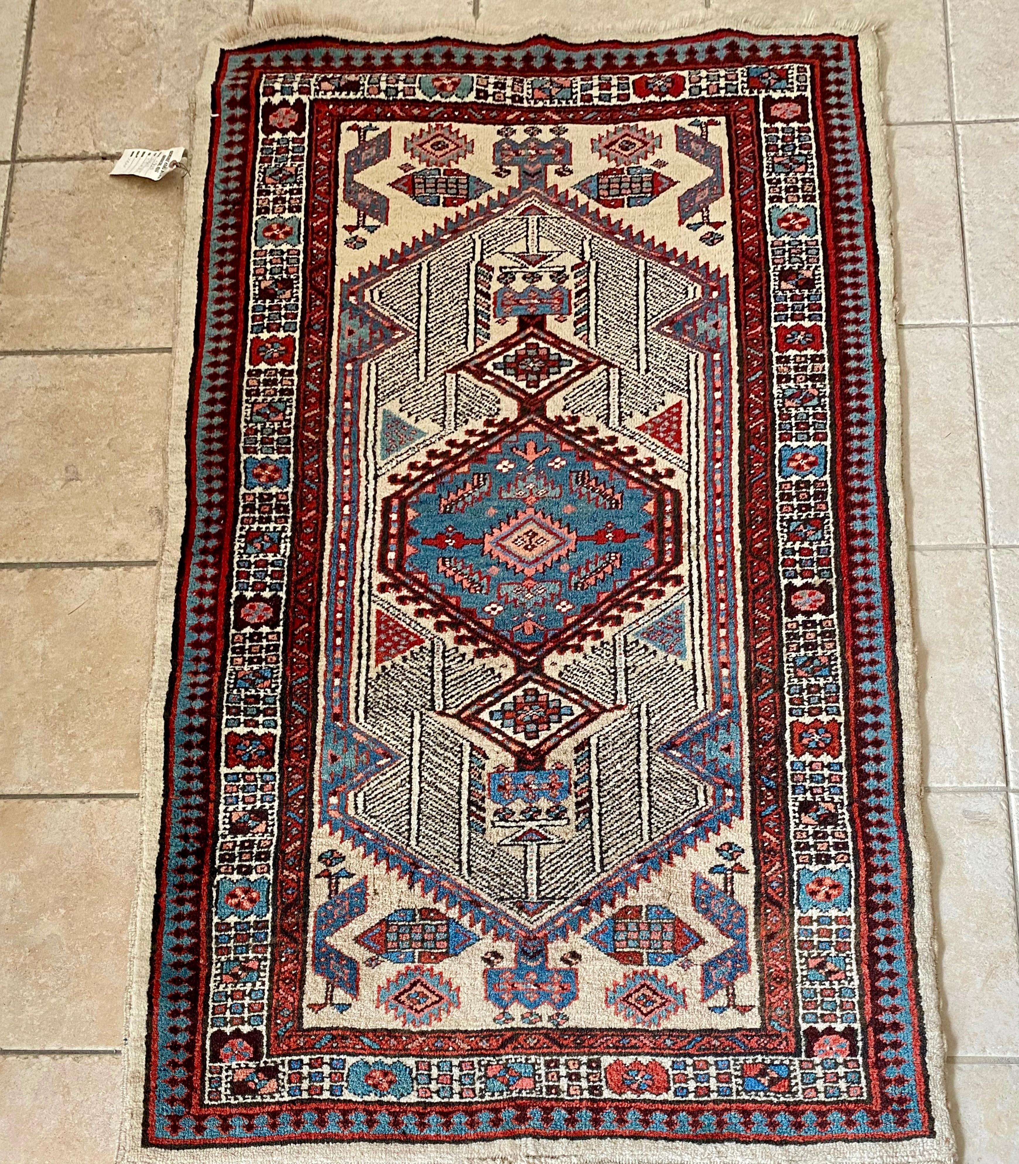 This is a lovely pair of antique Persian Sarab rugs from the 1960s and each piece measures 3.2 x 5.5 ft. the pair is in excellent condition.

Sarab or Serab is a small village situated in Northwest Iran where a tribe of weavers specialized in