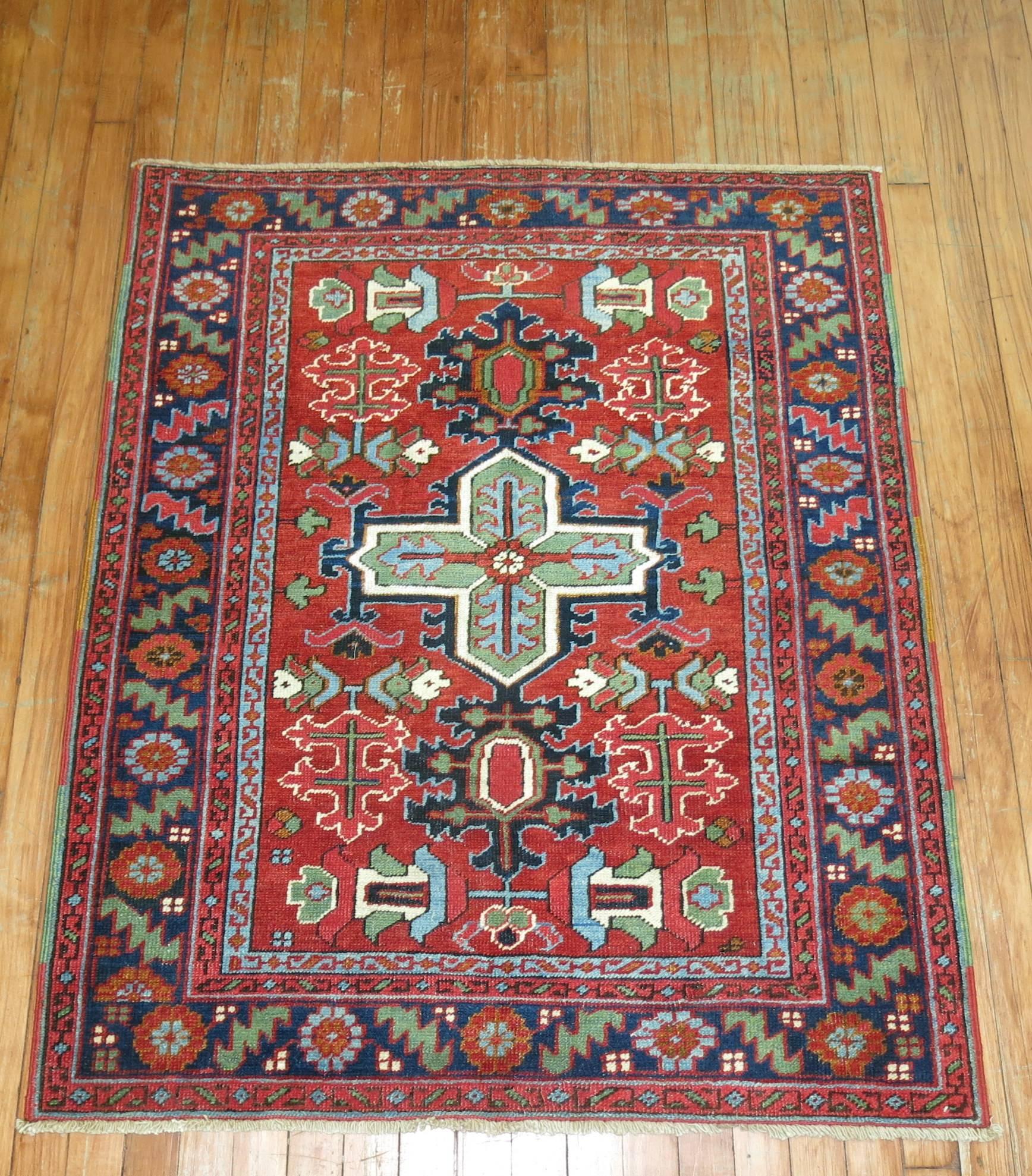 A close to a matching pair of one of a kind antique Persian Serapi rugs from the early stages of the 20th century. Measuring: 40'' x 49'' and 41'' x 50'' respectively.