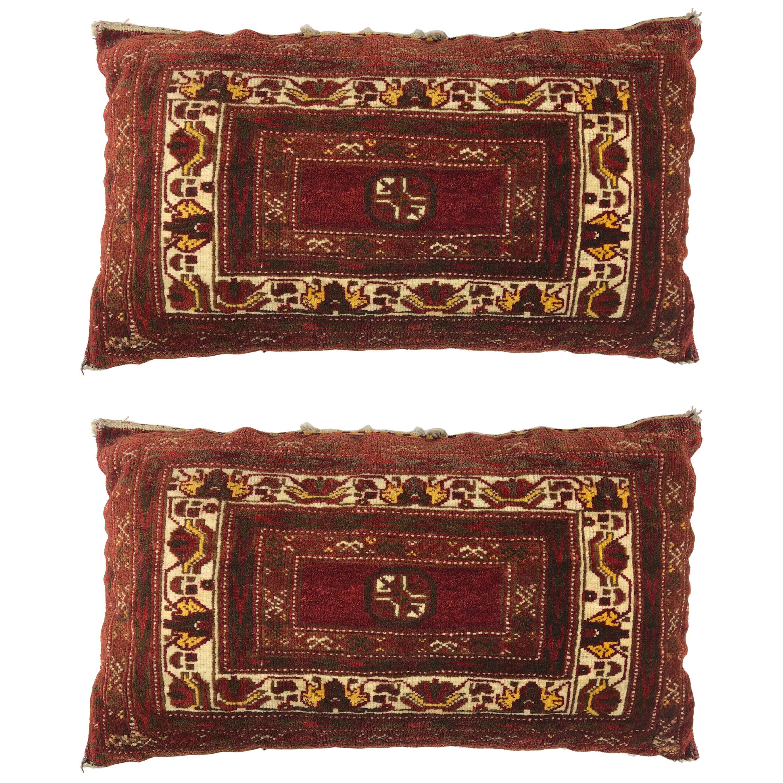 Pair of Antique Pillows Made From Vintage Rug Fragment For Sale