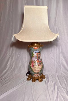 Pair of Antique Porcelain Urns Converted to Lamps with Bronze Mounts
