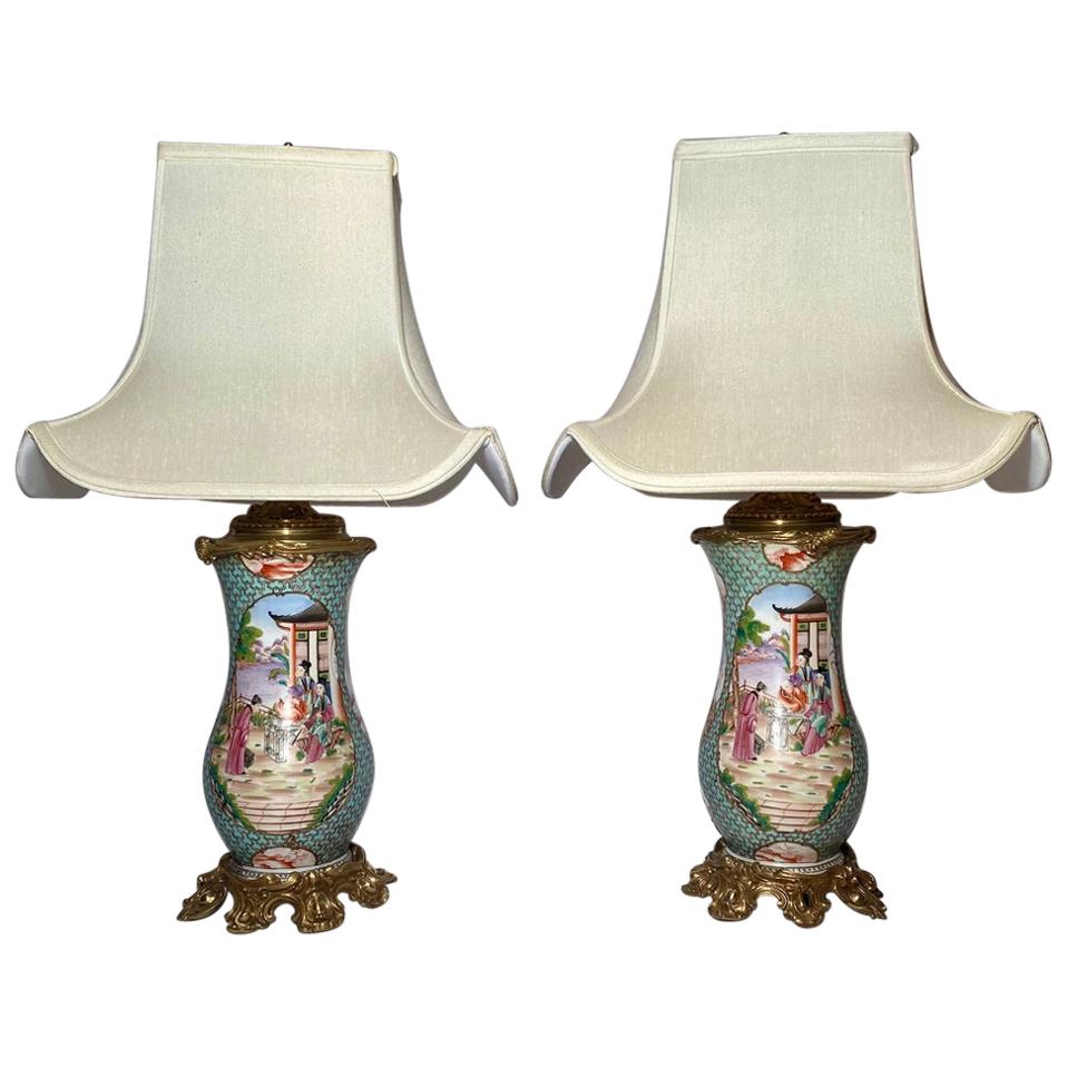 Pair of Antique Porcelain Urns Converted to Lamps with Bronze Mounts
