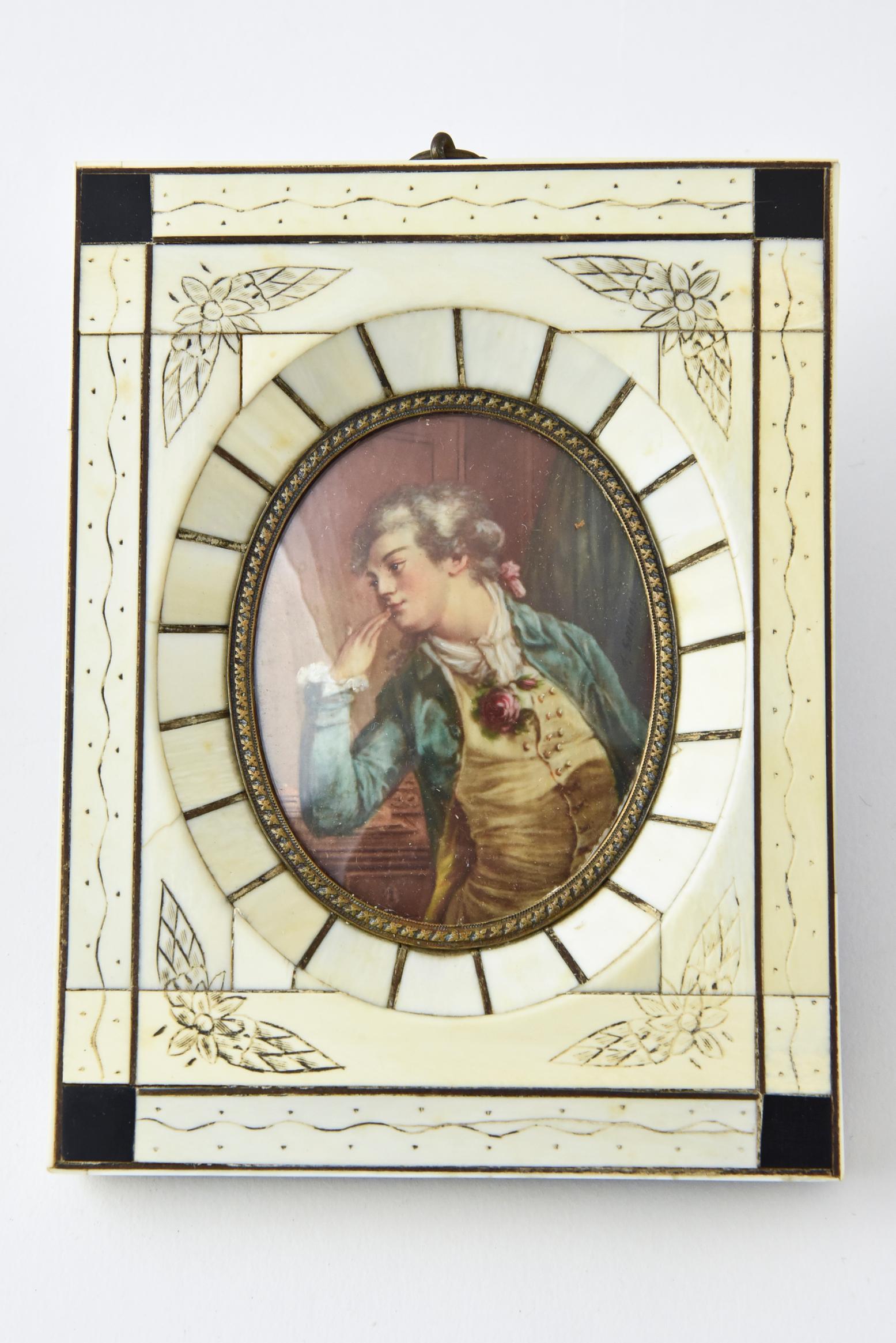 Pair of antique 19th century artist-signed hand painted miniature portraits of two lovers looking at each other from individual inlaid bone frames. Artist-signed J. Smont. The noble man is depicting MOZART courting a Risqué Noble Lady (look closely