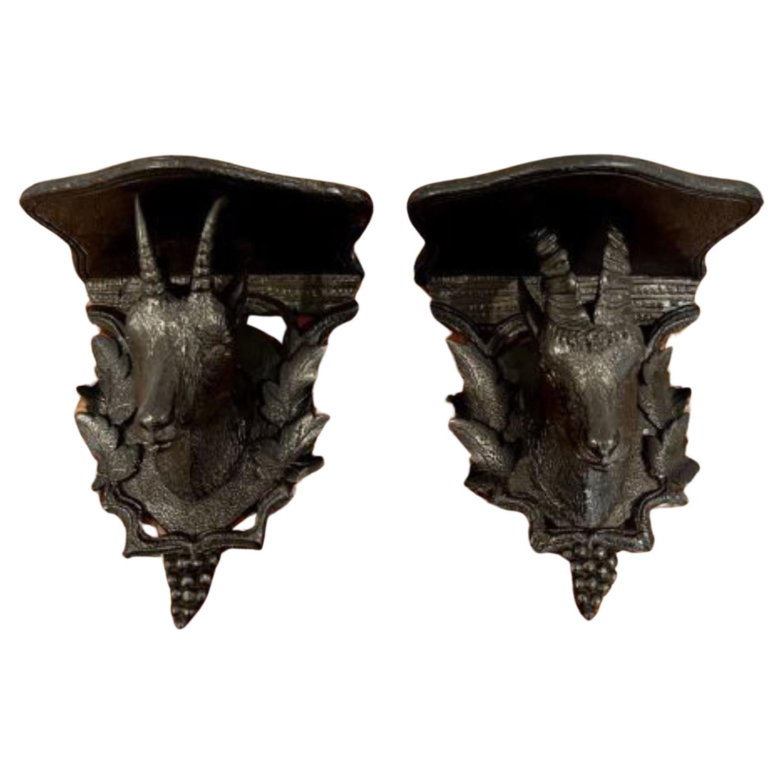 Pair of antique quality Black Forest carved wall brackets