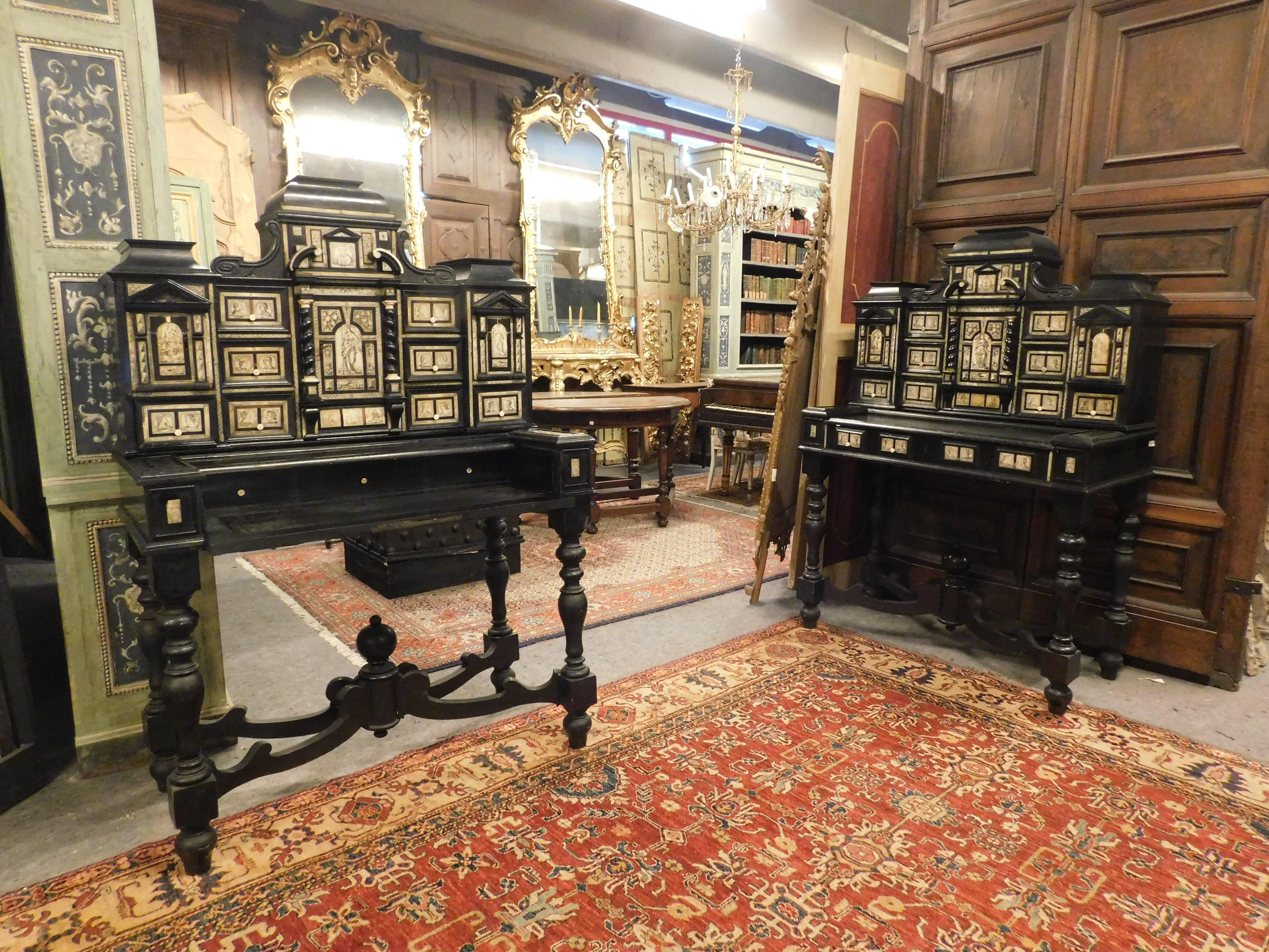 Ancient pair of solid wood coin cabinets, richly inlaid and shaped, with many front drawers and a central door with a temple shape, enriched by twisted columns and drawings of venus and beautiful classic decorations, they also have secret