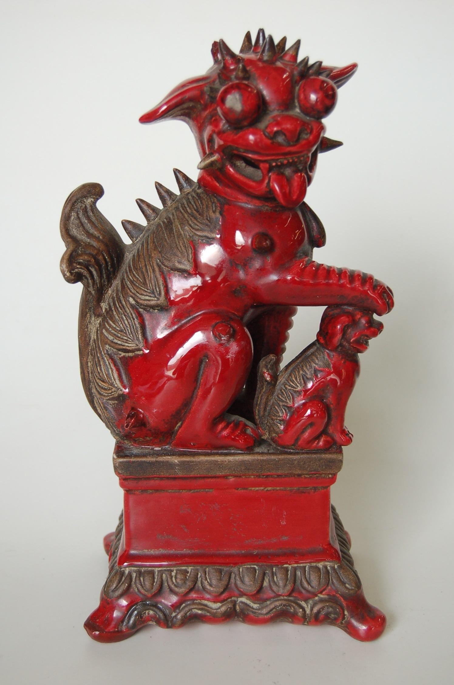 Pair of antique red ceramic Chinese flying dragons figures. 

Measures 12