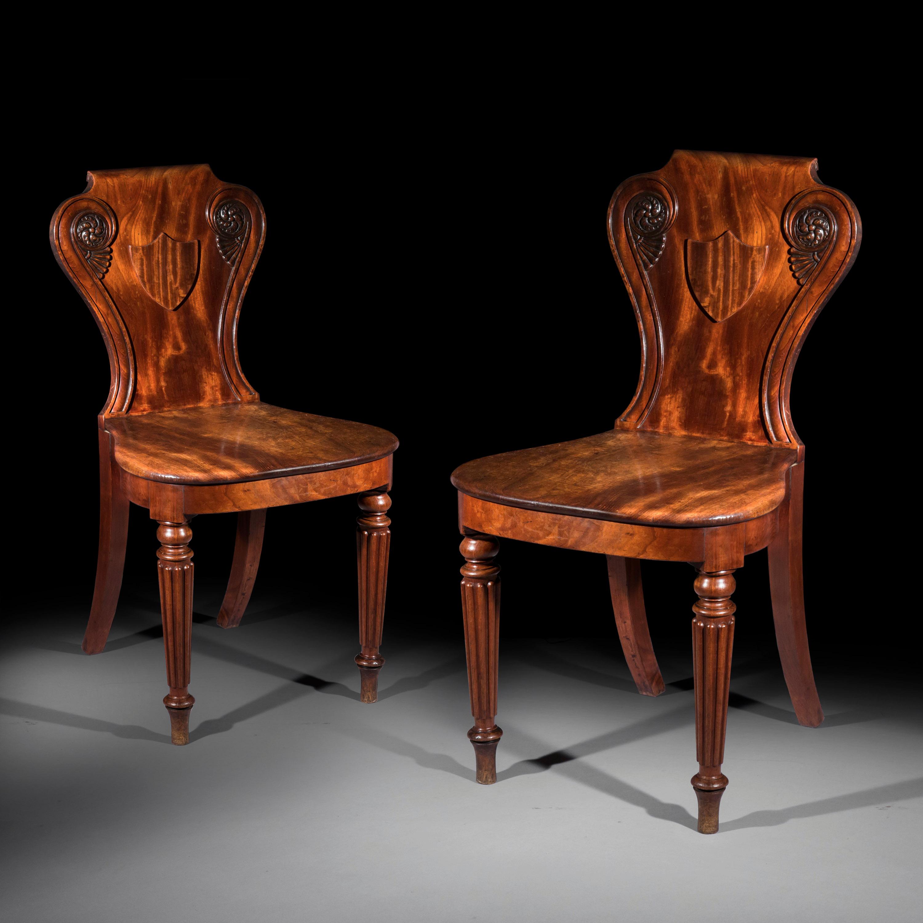 A very fine and elegant pair of hall chairs of the Regency period, almost certainly by Gillows of Lancaster and London,
England, circa 1815.

Why we like them
These are superb quality, wonderfully stylish hall chairs, made of superbly figured