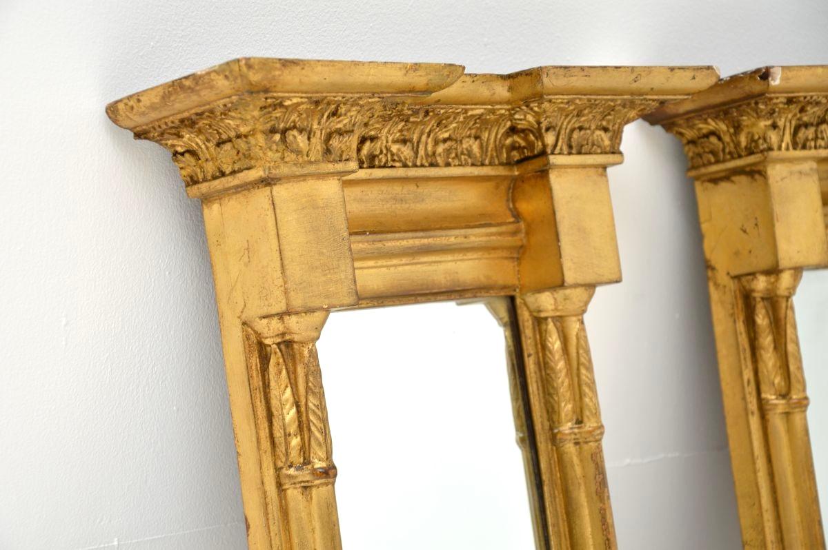 Pareja de espejos de muelle de madera dorada antiguos de la época de la Regencia principios del siglo XIX en venta