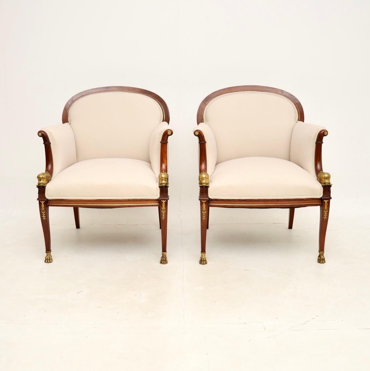 A magnificent pair of antique Regency Style armchairs. They were recently imported from Sweden, and they date from around the 1880-1900 period.

The quality is outstanding and they have an absolutely gorgeous design. There are fantastic gilt bronze