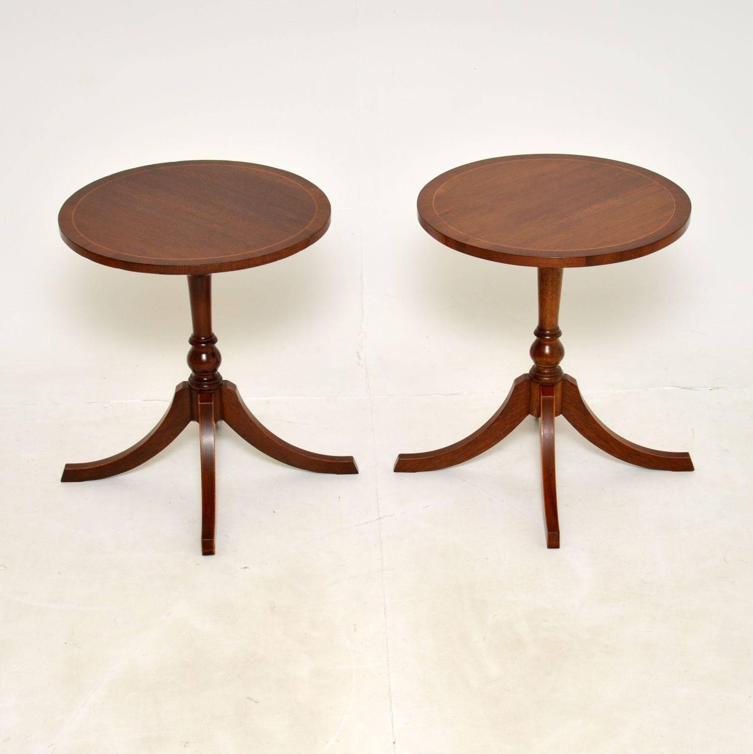 A lovely pair of inlaid wood wine tables with circular tops. These are in the antique Regency style, they were made in England and date from around the 1950’s.

The quality is fantastic, these are well built and have a very elegant design. The