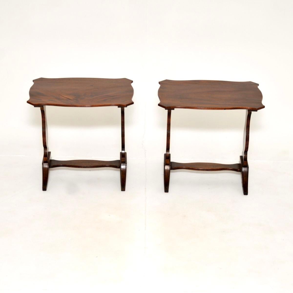 A smart and beautifully designed pair of antique side tables. They were made in England, they date from the 1900-1920 period.

The quality is superb, they are a very useful size and look great from all angles. The tops have serpentine shaped edges,