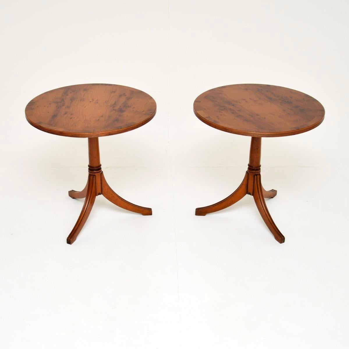 A smart and beautifully designed pair of antique Regency style yew wood side tables. They were made in England, they date from around the 1950’s.

The quality is fantastic and they are a very useful size. The circular tops have cross banded edges