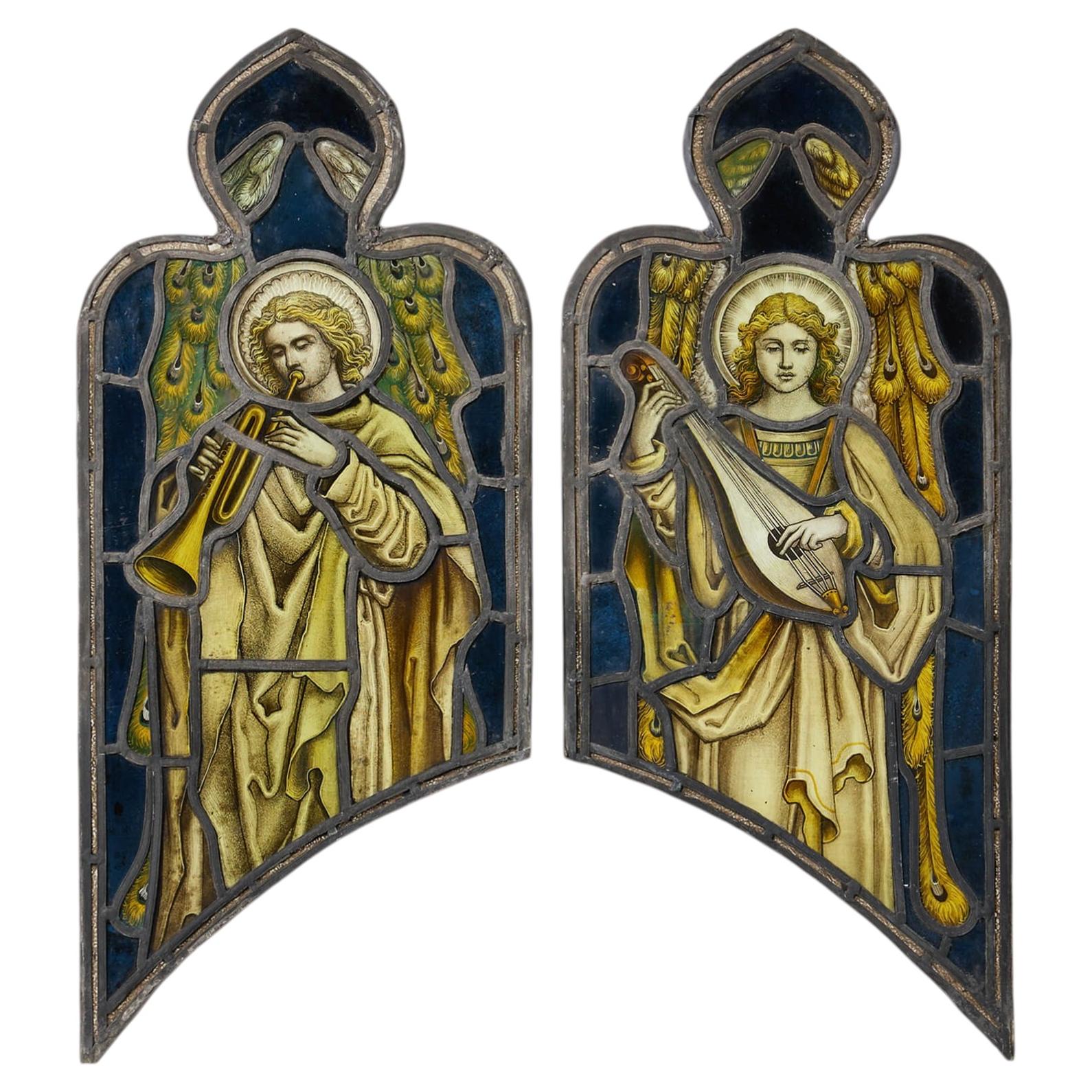 Coppia di antiche vetrate religiose di Atkinson Bros.