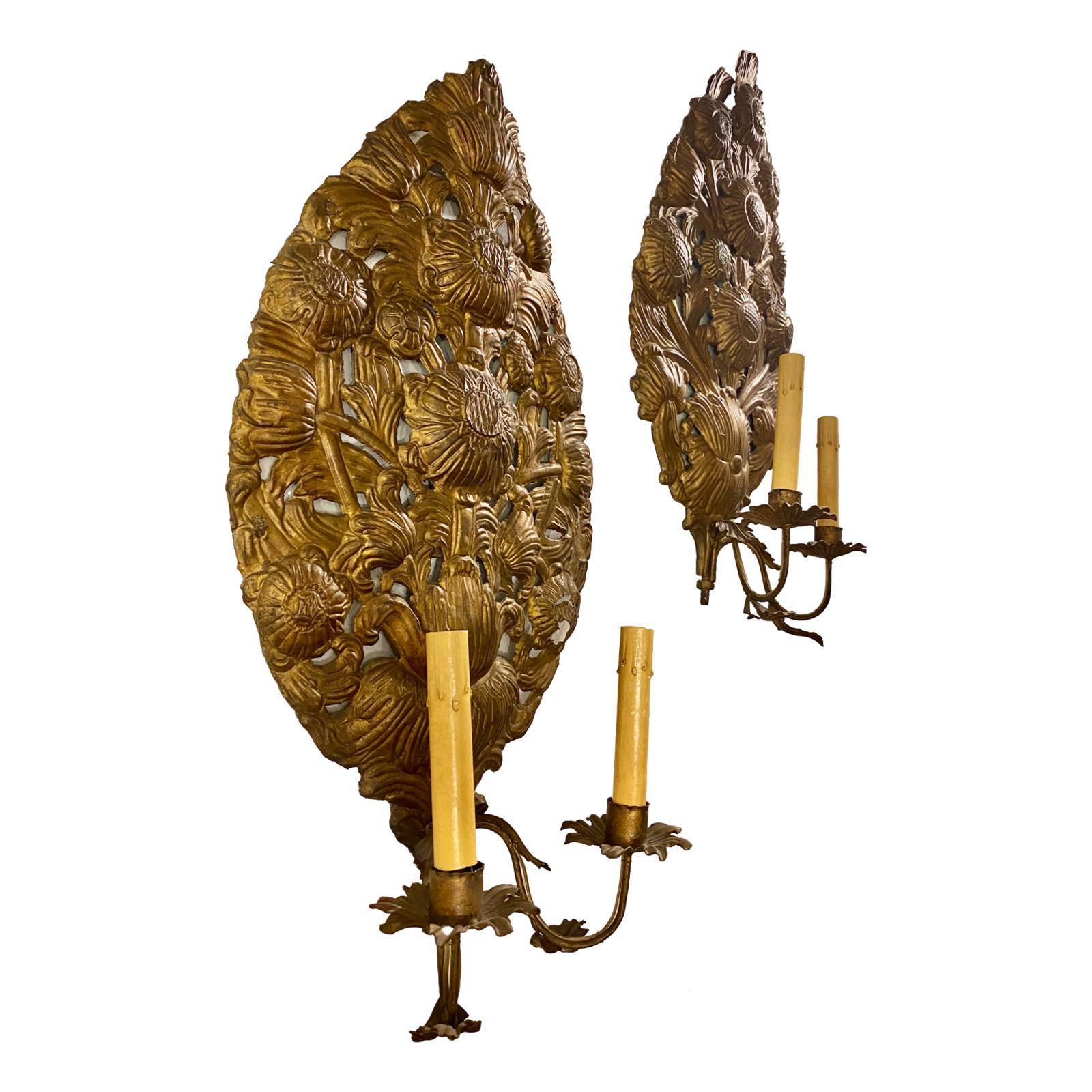 Pair of circa 1900 Italian repoussé metal two-arm sconces in the shape of flower bouquets.

Measurements:
Height: 22