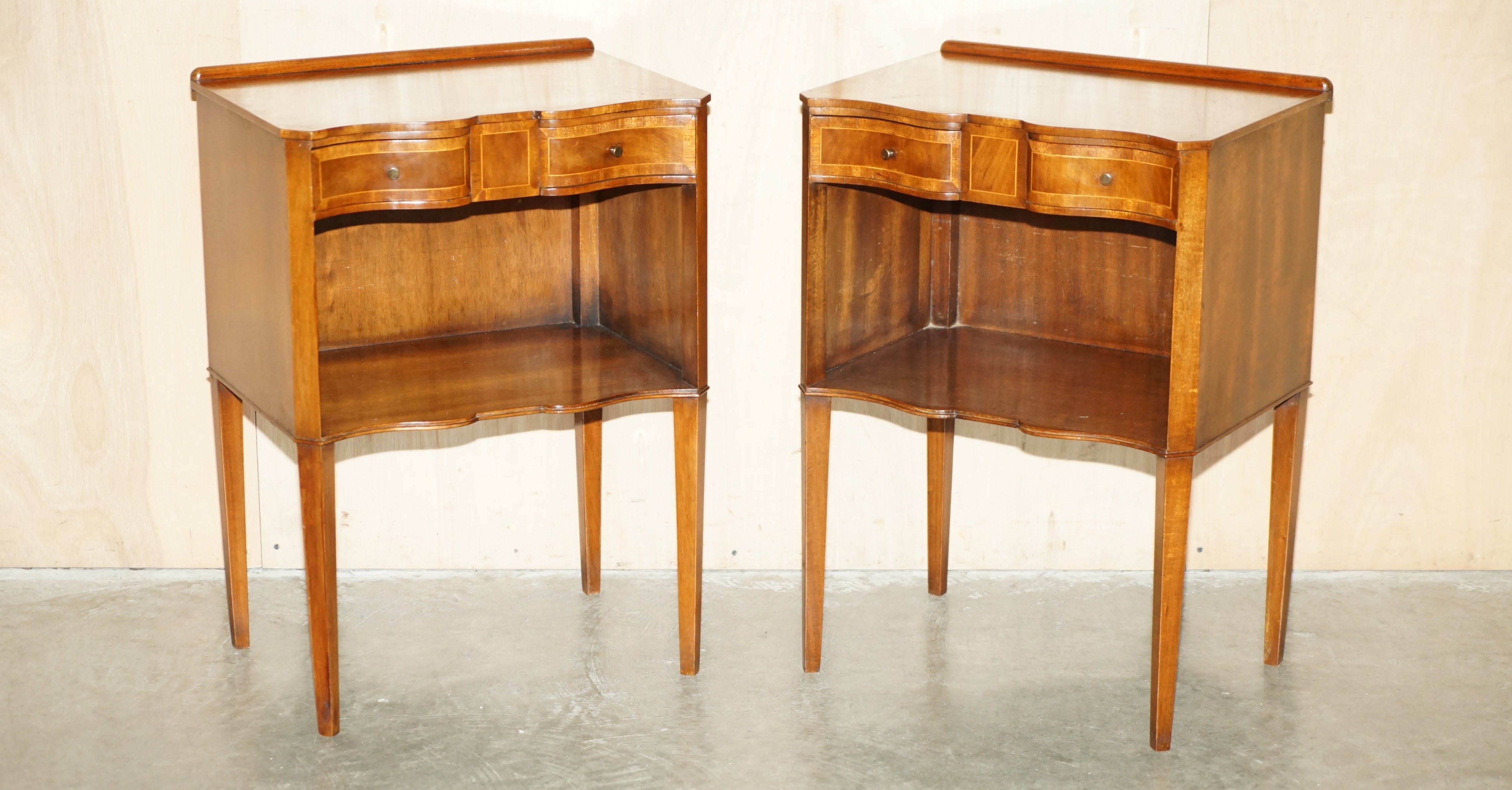 Royal House Antiques

Royal House Antiques is delighted to offer for sale this absolutely exquisite pair of fully restored, Flamed Mahogany, Serpentine fronted bedside or side tables

Please note the delivery fee listed is just a guide, it covers