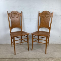 Pair of Antique Ribbon Carved Caned Seat Side Chairs