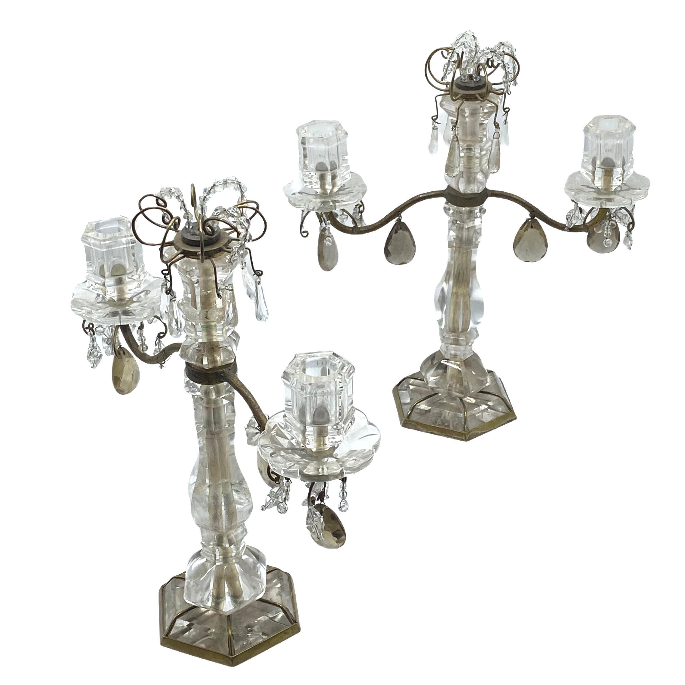 Pair of 19 century French rock crystal and bronze two-light candelabras.
Very fine quality and high grade rock crystal.