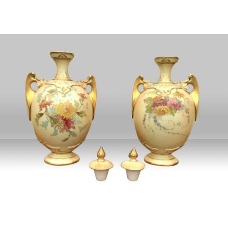 Beautiful pair of antique Royal Worcester Blush Ivory Hand Painted Vases.

Dated 1892
20cm x 10cm x 9cm

Declaration: This item is antique. The date of manufacture has been declared as 1890.

Dimensions:
Height = 20 cm (7.9