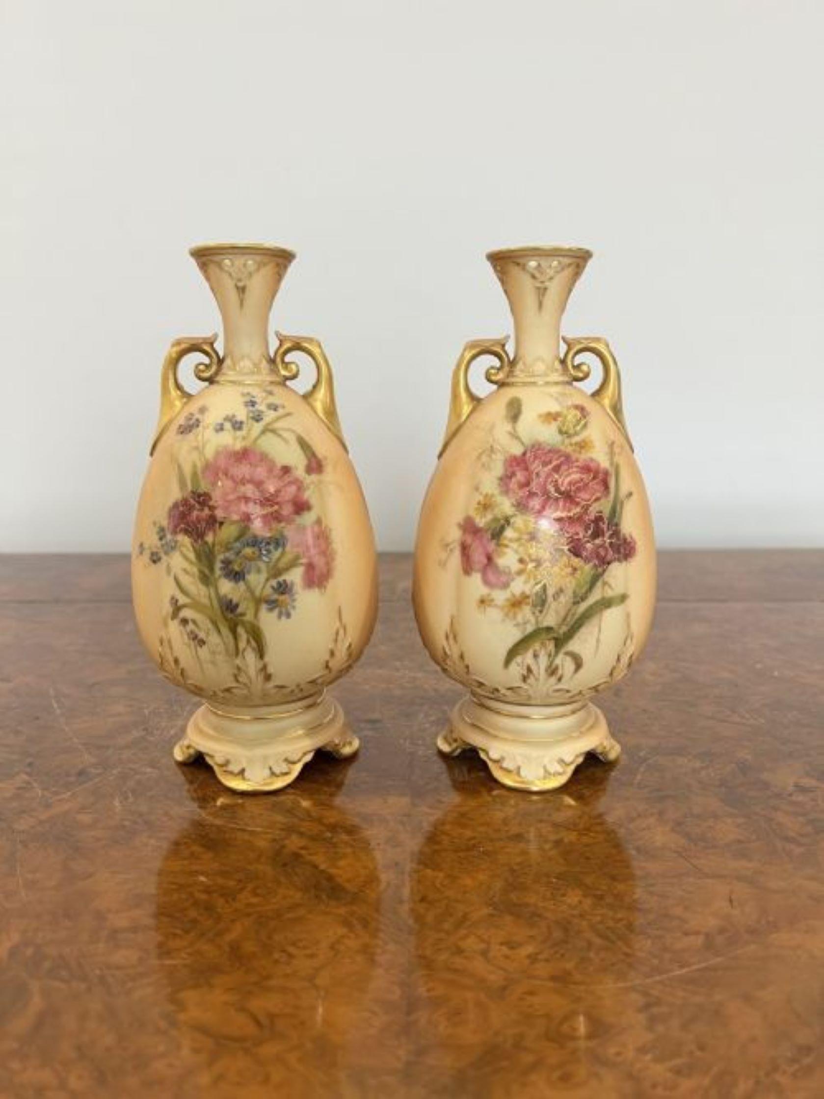 Pair of antique Royal Worcester vases, fantastic quality pair of antique Royal Worcester blush ivory vases having hand painted flowers and foliage in wonderful red, green, yellow and gold colours 