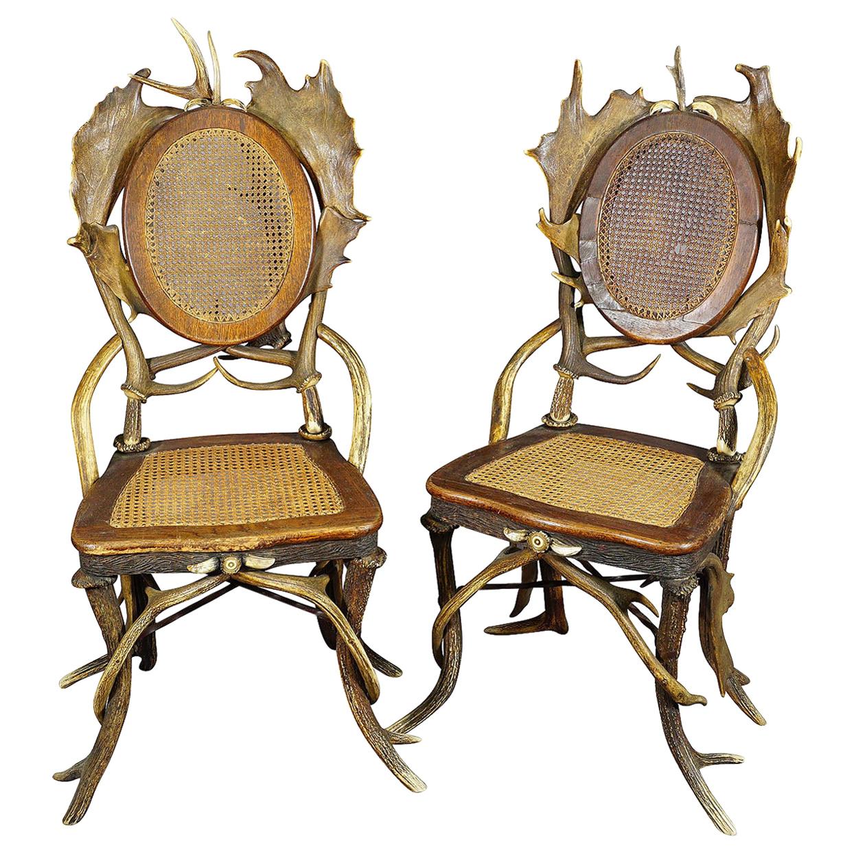 Paire de fauteuils de salon anciens rustiques en bois de cervidé, Allemagne, vers 1900 en vente