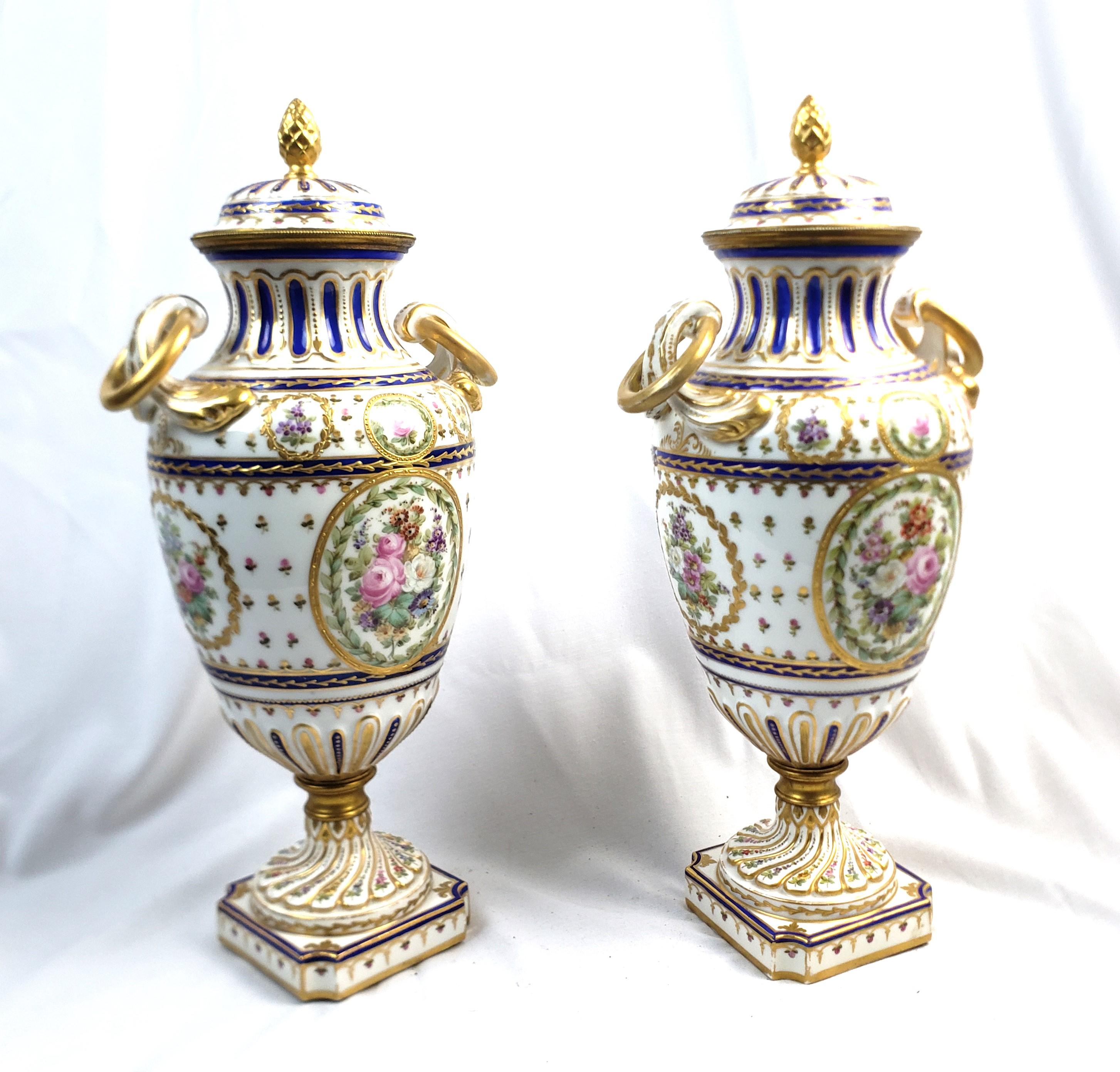 French Pair of Antique Sevres Styled Covered Urns with Ornate Hand-Painted Decoration For Sale