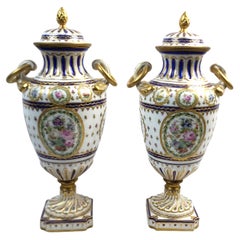 Pair of Antique Sevres Styled Covered Urns with Ornate Hand-Painted Decoration