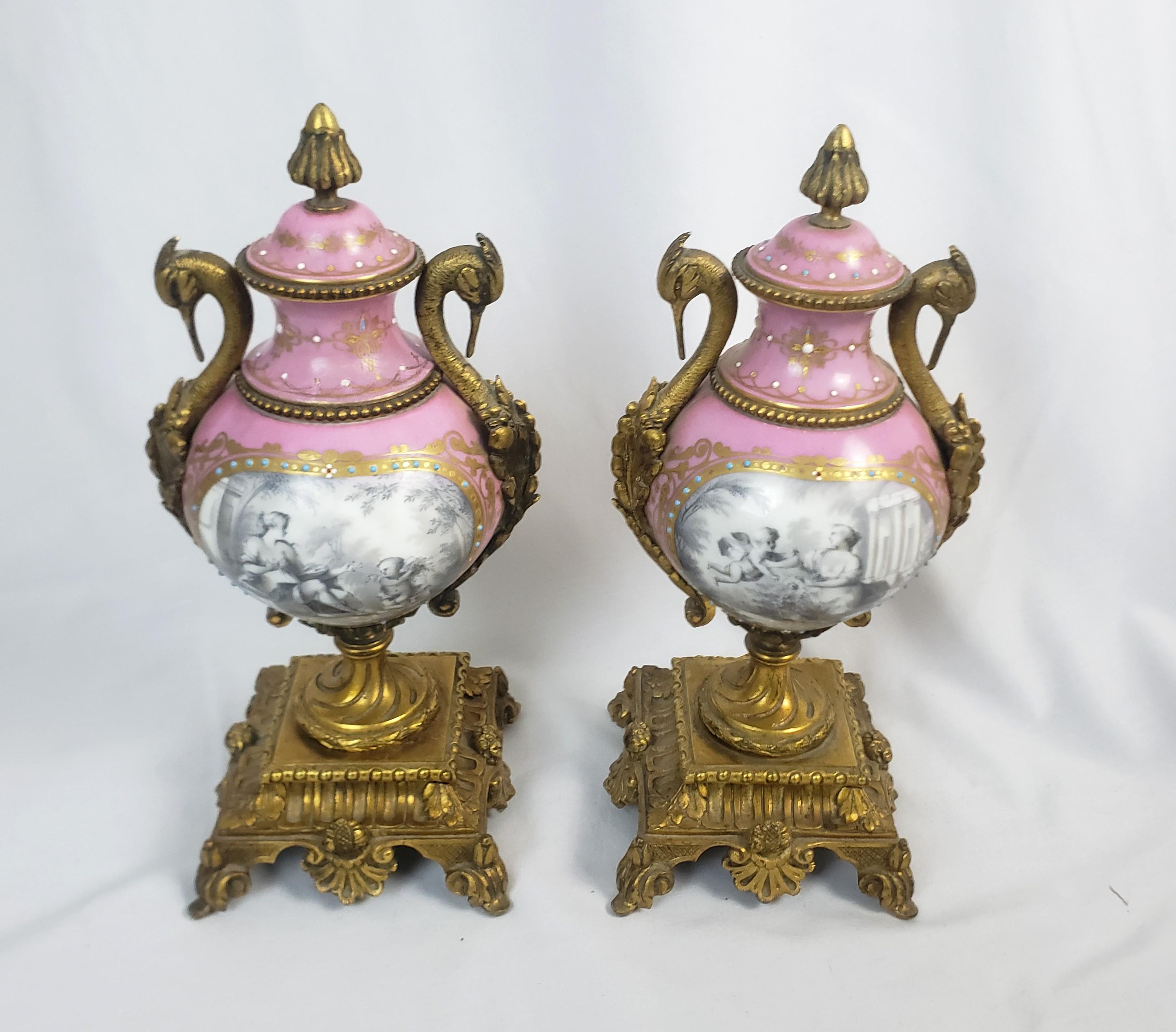 Renaissance Revival Pair of Antique Sevres Styled Porcelain & Ornate Gilt Bronze Garnitures For Sale
