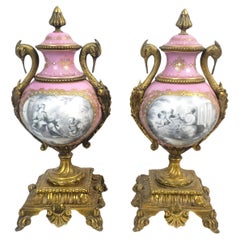 Pair of Used Sevres Styled Porcelain & Ornate Gilt Bronze Garnitures