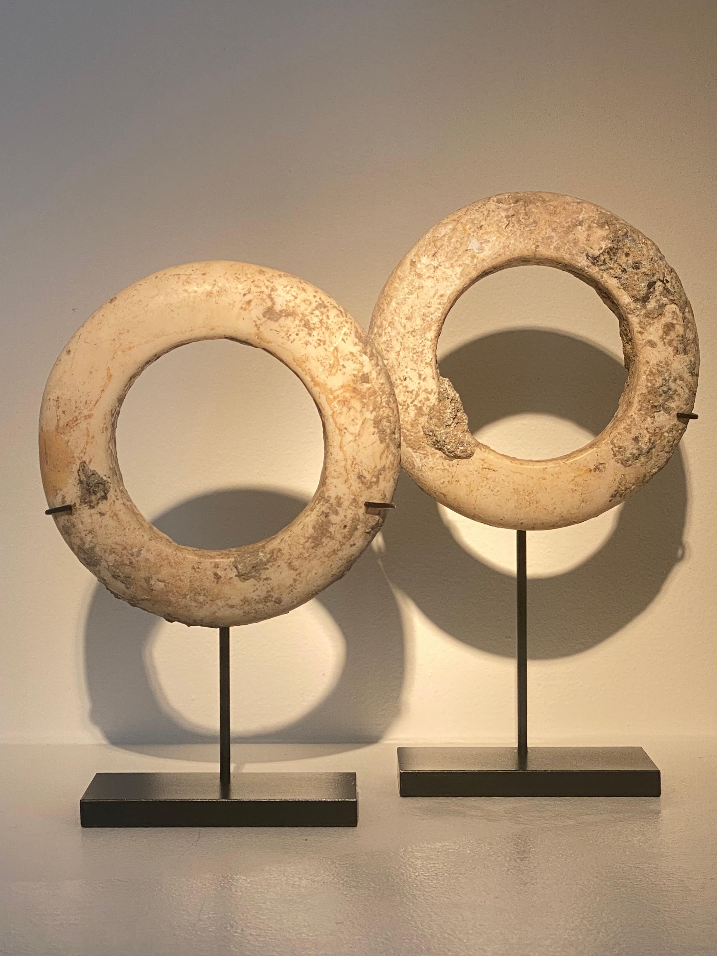 An exceptional pair of South-East-Asian Bracelets made of Shell,
from the Thailand Region , Bang Chiang Period,
prehistoric period,5000-7000 years old,
the hand-carved bracelets have a beautiful and aged patina,
they have also a smooth and round