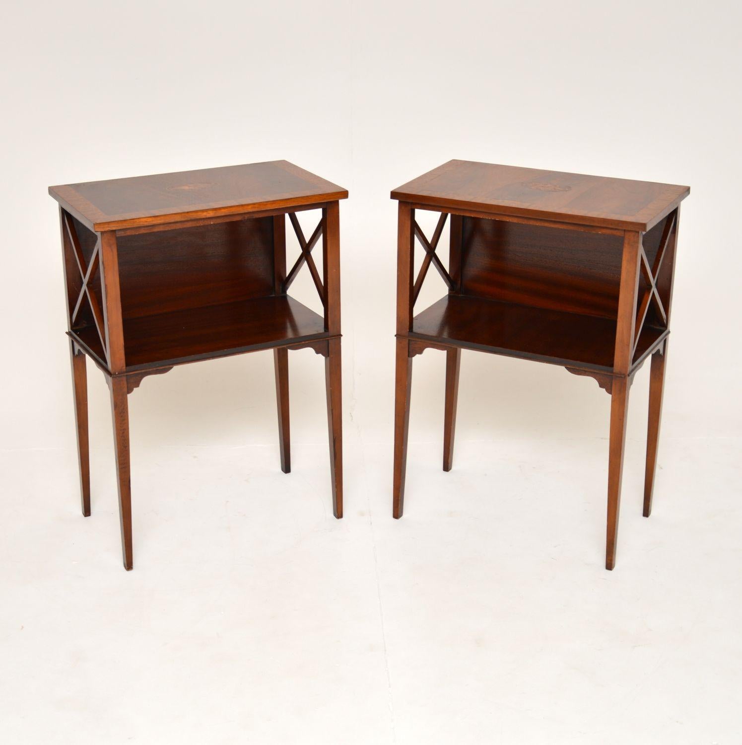 A beautiful and elegant pair of antique inlaid side tables. They are in the classic Sheraton style, they were made in England and date from around the 1930’s.

The quality is excellent and they are a very useful size. The tops are beautifully