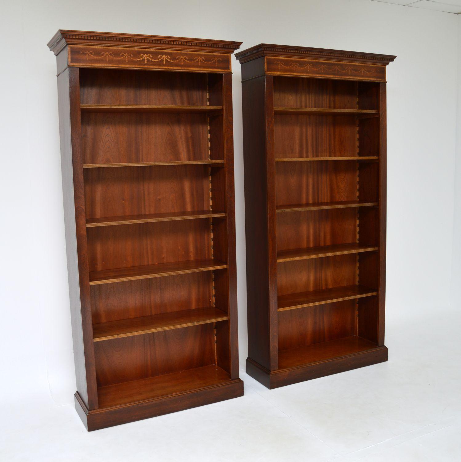 A smart and very useful pair of open bookcases in the antique Sheraton style. These were made in England, they date from around the 1950-60’s. The quality is fantastic, these are very tall and have storage space for lots of books. Each has five