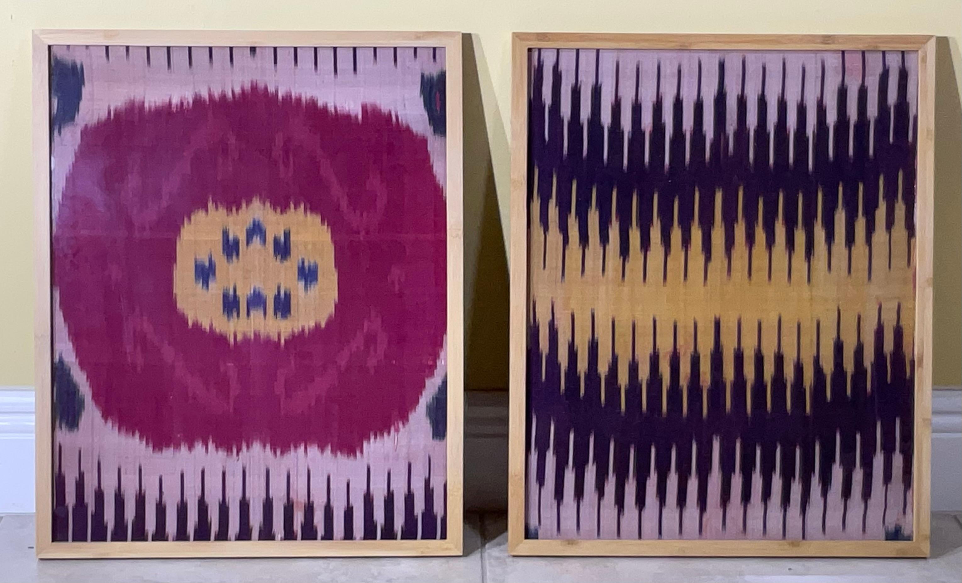 Beautiful antique Ikat textile made of silk , cheerful colours , handmade by tribal man and female artists, circular and geometrical motifs ,professionally mounted and displayed in frames made of bamboo wood , protected by glass . Great looking wall