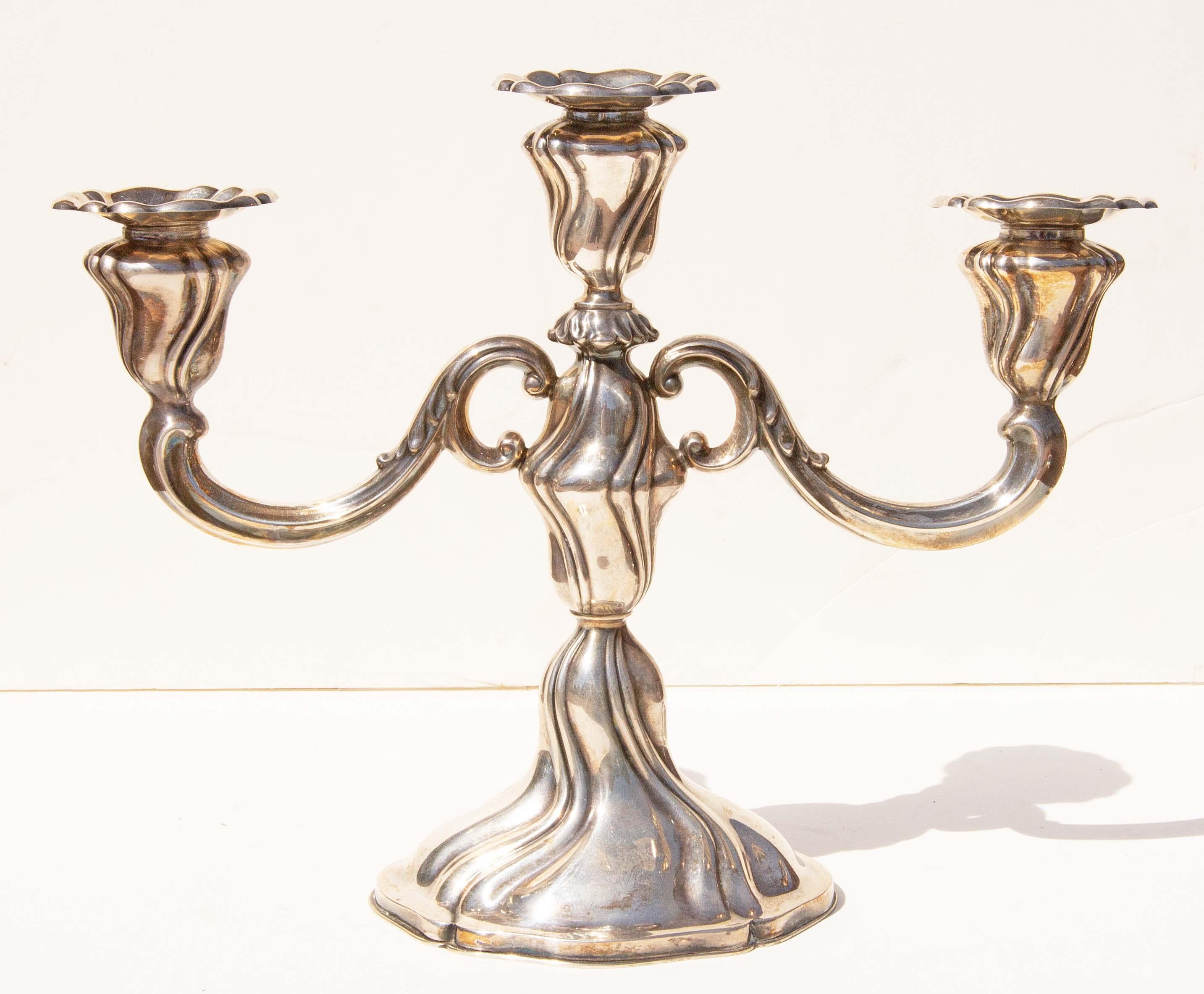 Pair of antique .835 silver candelabra, German, early 20th century. Good condition. Not weighted. Need some polishing.