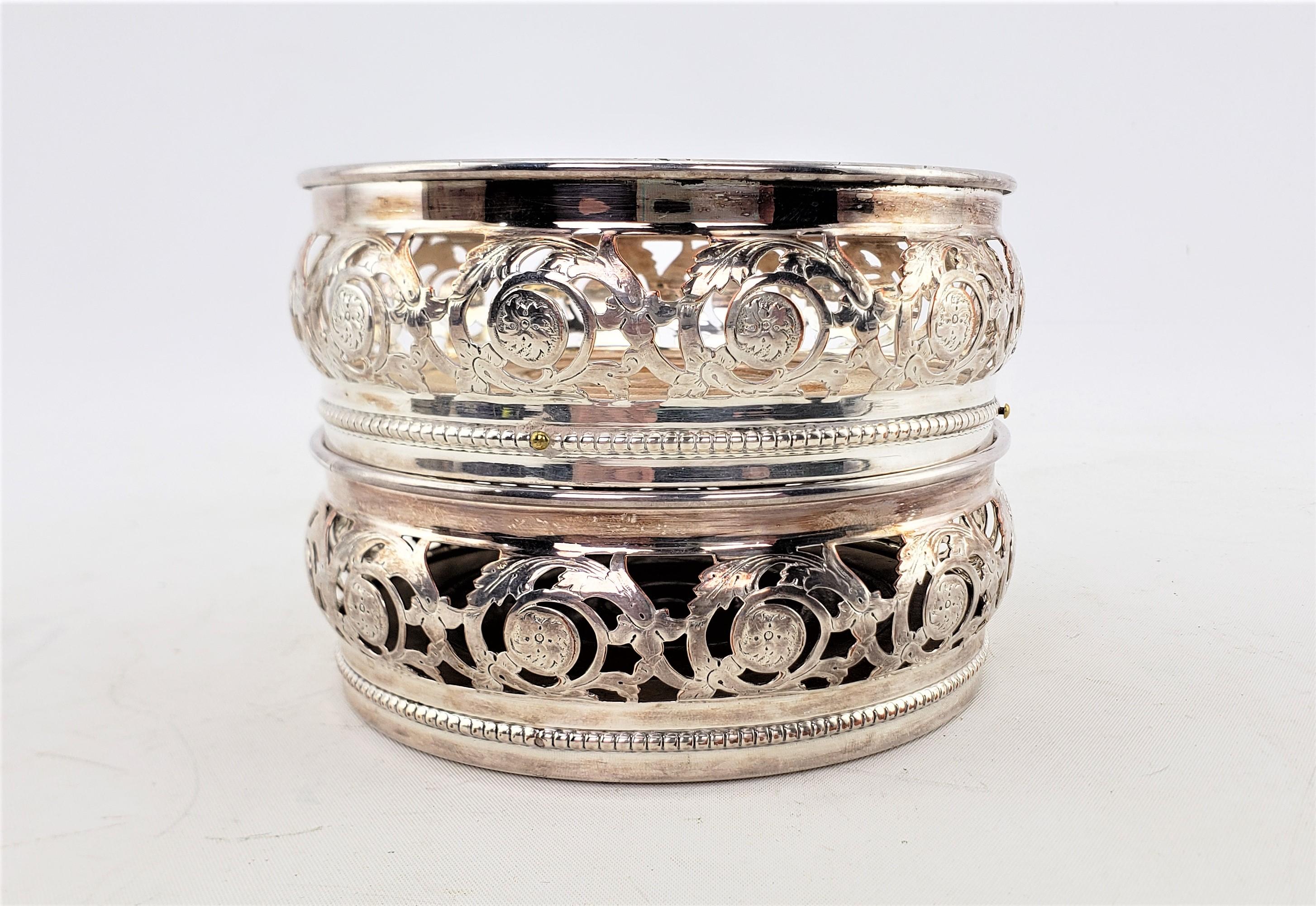 Pair of Antique Silver Plated Bottle Coasters with Floral Engraved Pierced Sides For Sale 3