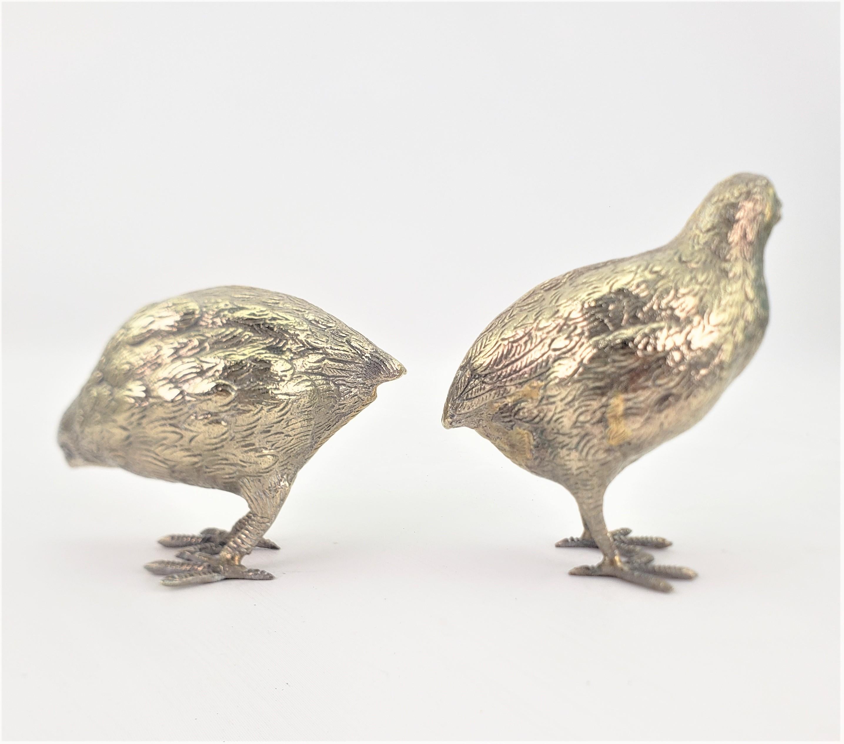This pair of antique silver plated game birds are unsigned, but presumed to have been made in Europe, most likely Italy, in approximately 1890 in the period Victorian style. The birds are figural silver plated quails, and are nicely cast with