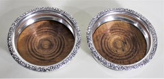Pair of Antique Silver Plated Wine Bottle Coasters with Leaf & Berry Decoration