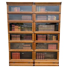 Coppia di antiche librerie Globe Wernicke in rovere massiccio