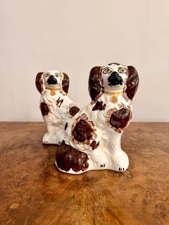 Pair of antique Staffordshire dogs