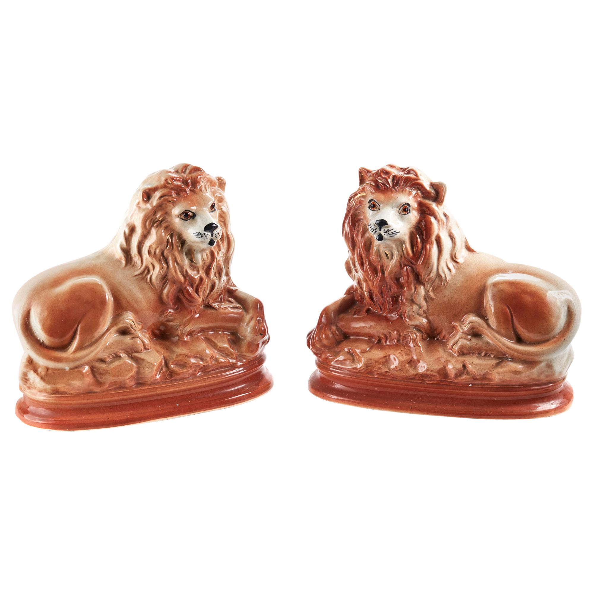 Pair of Antique Staffordshire Lions