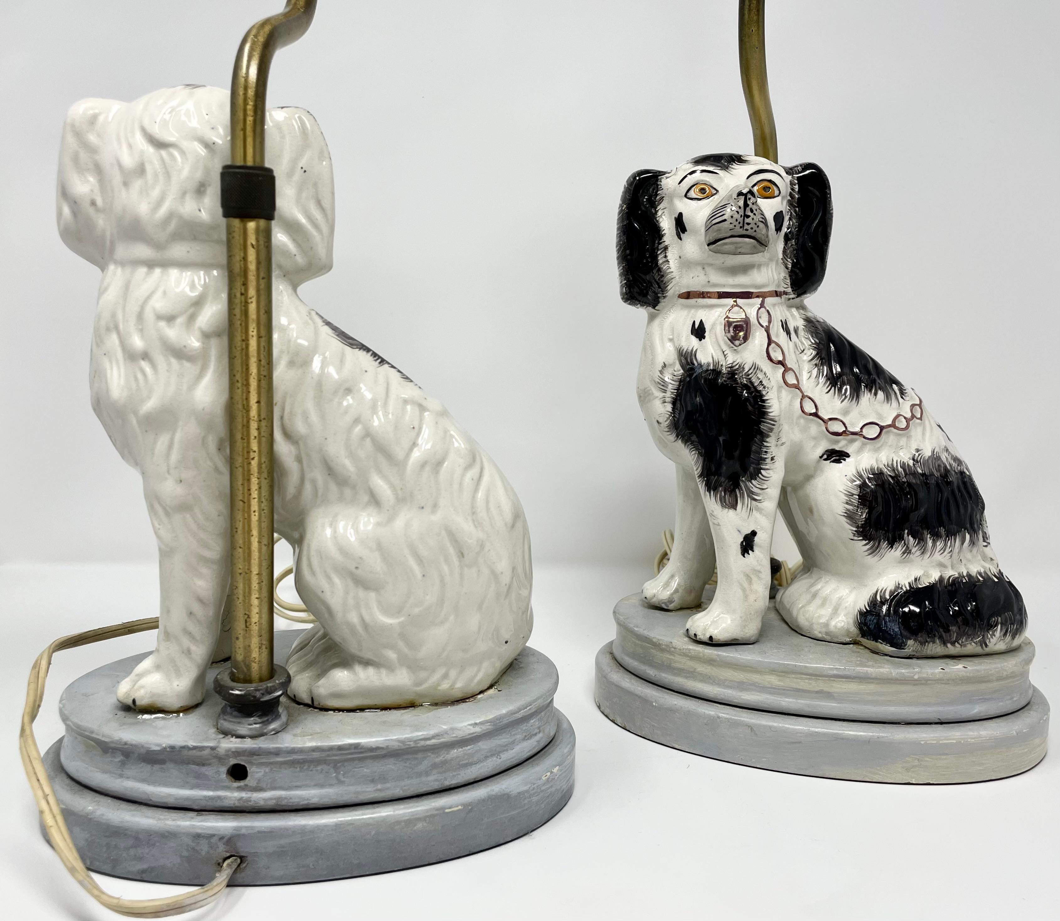 Porcelain Pair of Antique Staffordshire Spaniels Converted Lamps circa 1880 For Sale