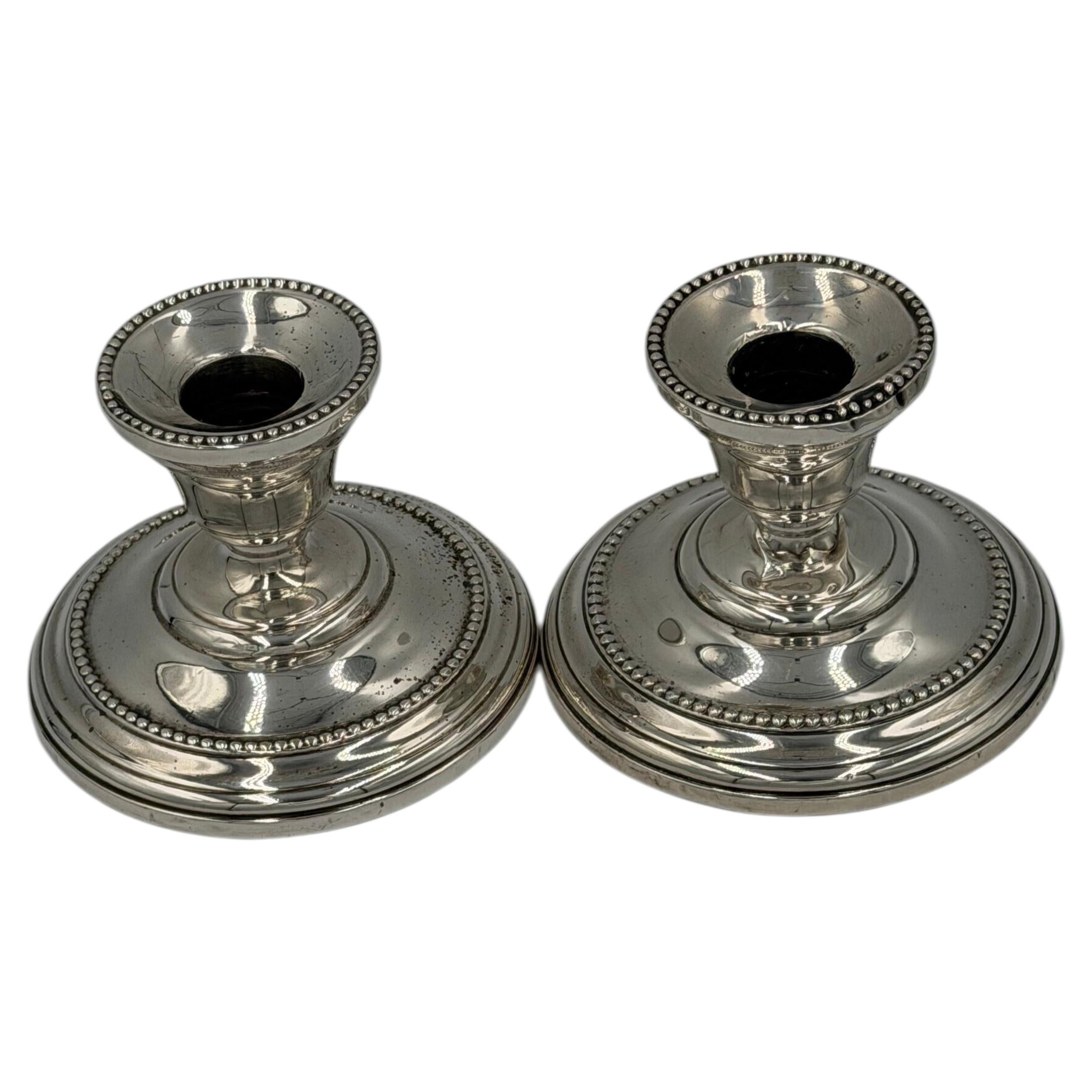 Pair of Antique Sterling Silver Candlesticks with Beaded Rim Detail For Sale