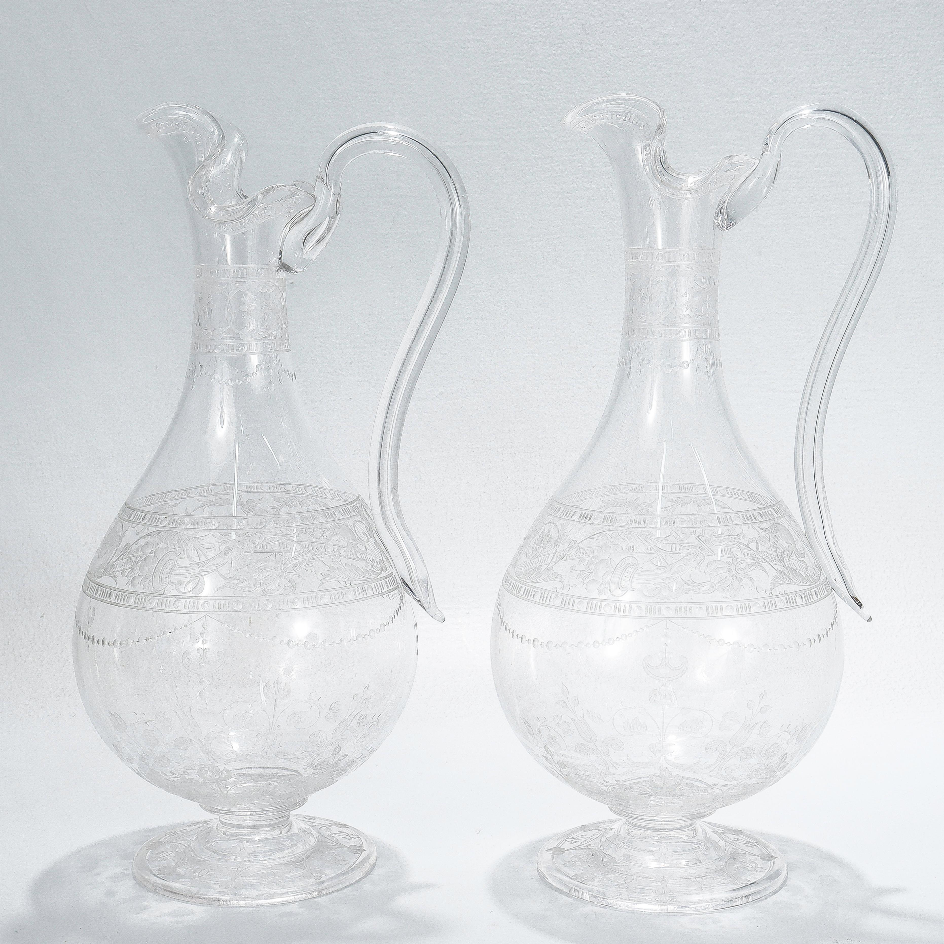 Pair of Antique Stourbridge Etched & Engraved Glass Water Pitchers or Decanters In Good Condition For Sale In Philadelphia, PA
