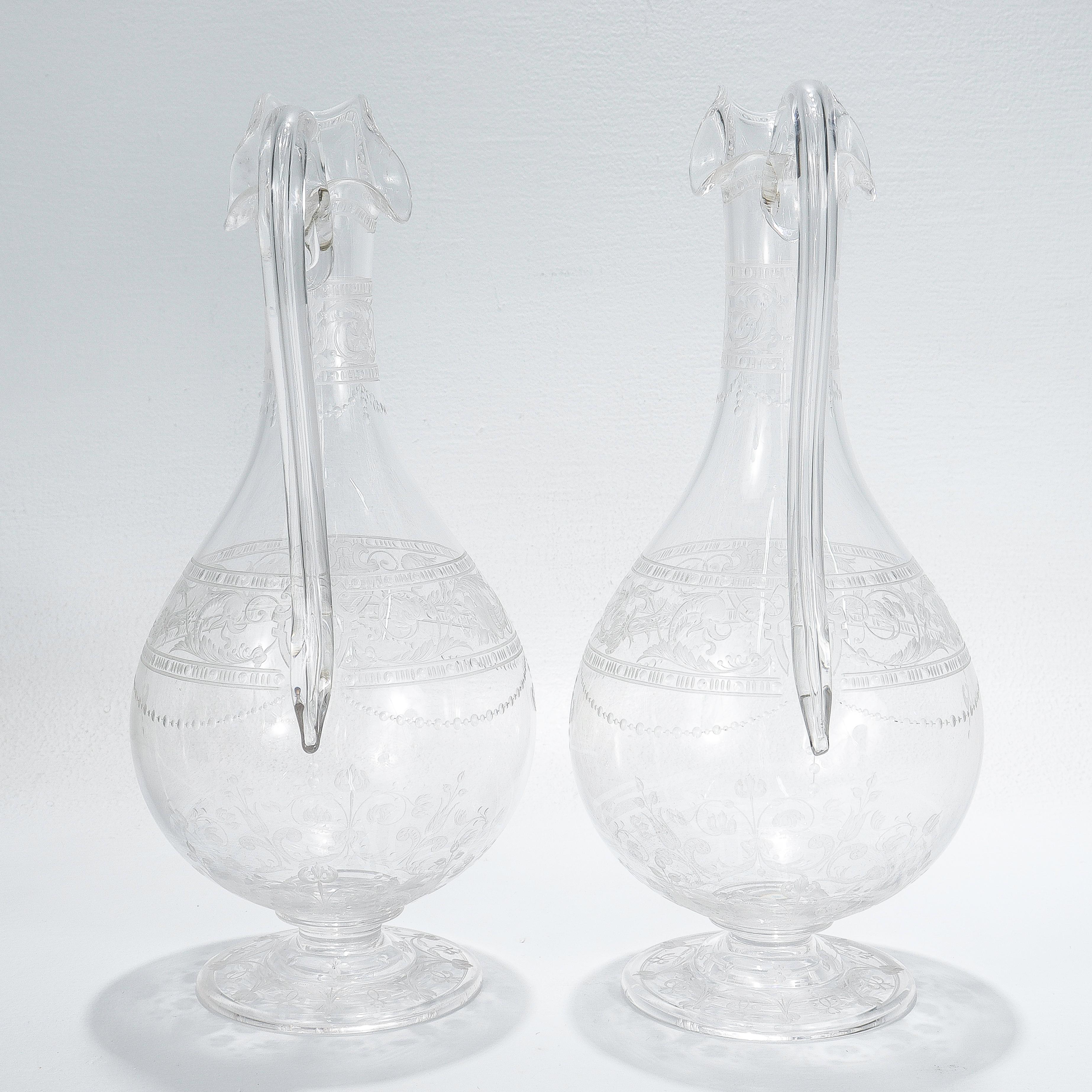 Pair of Antique Stourbridge Etched & Engraved Glass Water Pitchers or Decanters In Good Condition For Sale In Philadelphia, PA