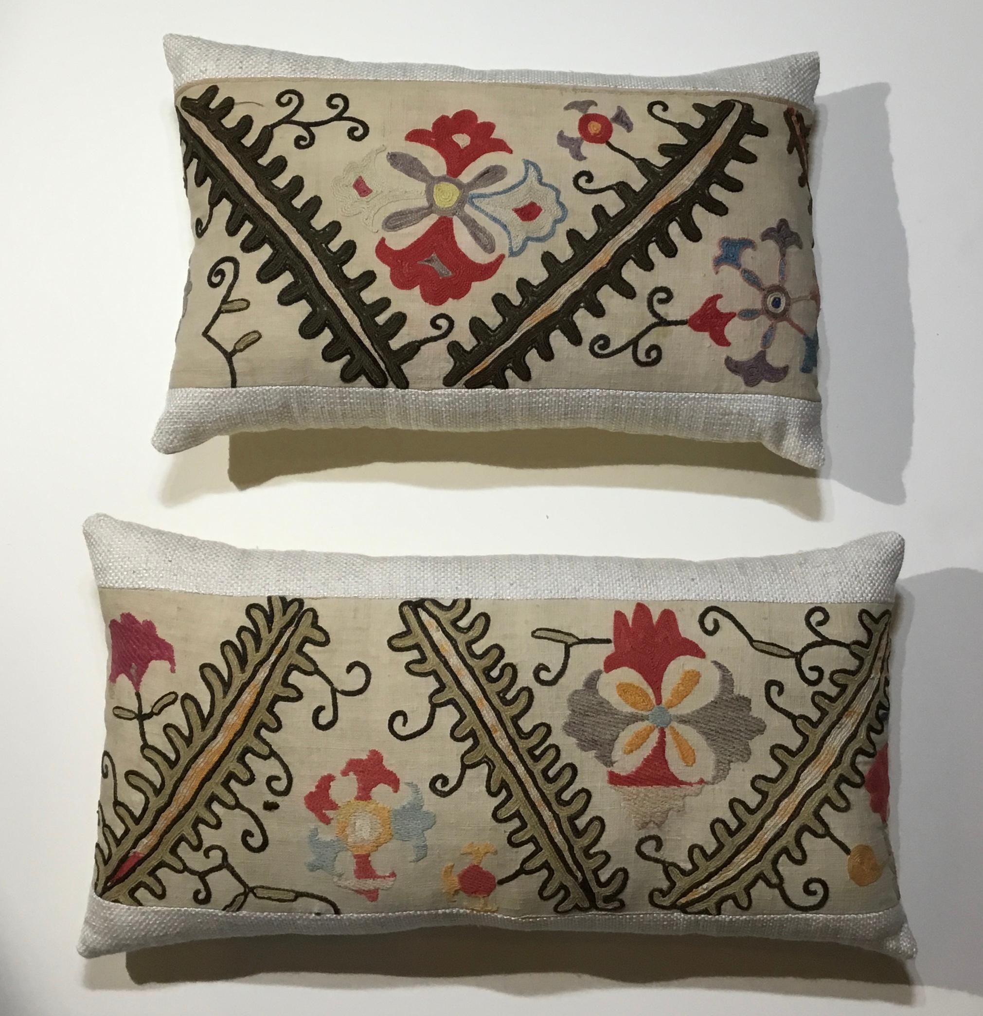 Beautiful pair of pillows made of hand embroidery on handmade cotton background, colorful motifs of vine and flowers motifs, fine cotton trimming and fine silk backing, Frash new inserts.
Size: 19” x 12” x 4”
22” x 11”.5 x 4”.
  