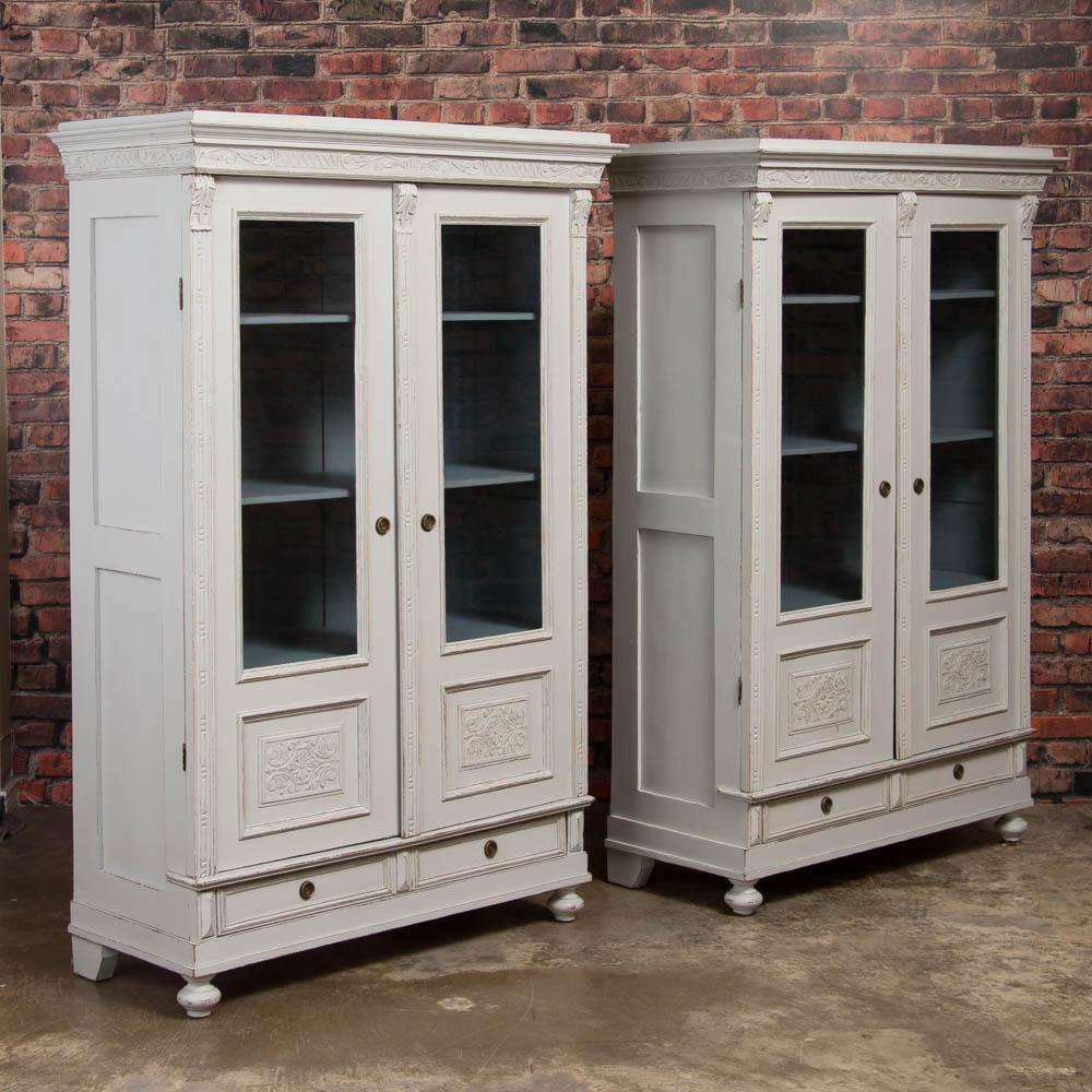 These exceptional bookcases are a tremendous find as it is difficult to find a matching pair. The lovely Gustavian gray paint is perfectly distressed to fit with the age and character of the pair. One notices the symmetry and balance of the Swedish
