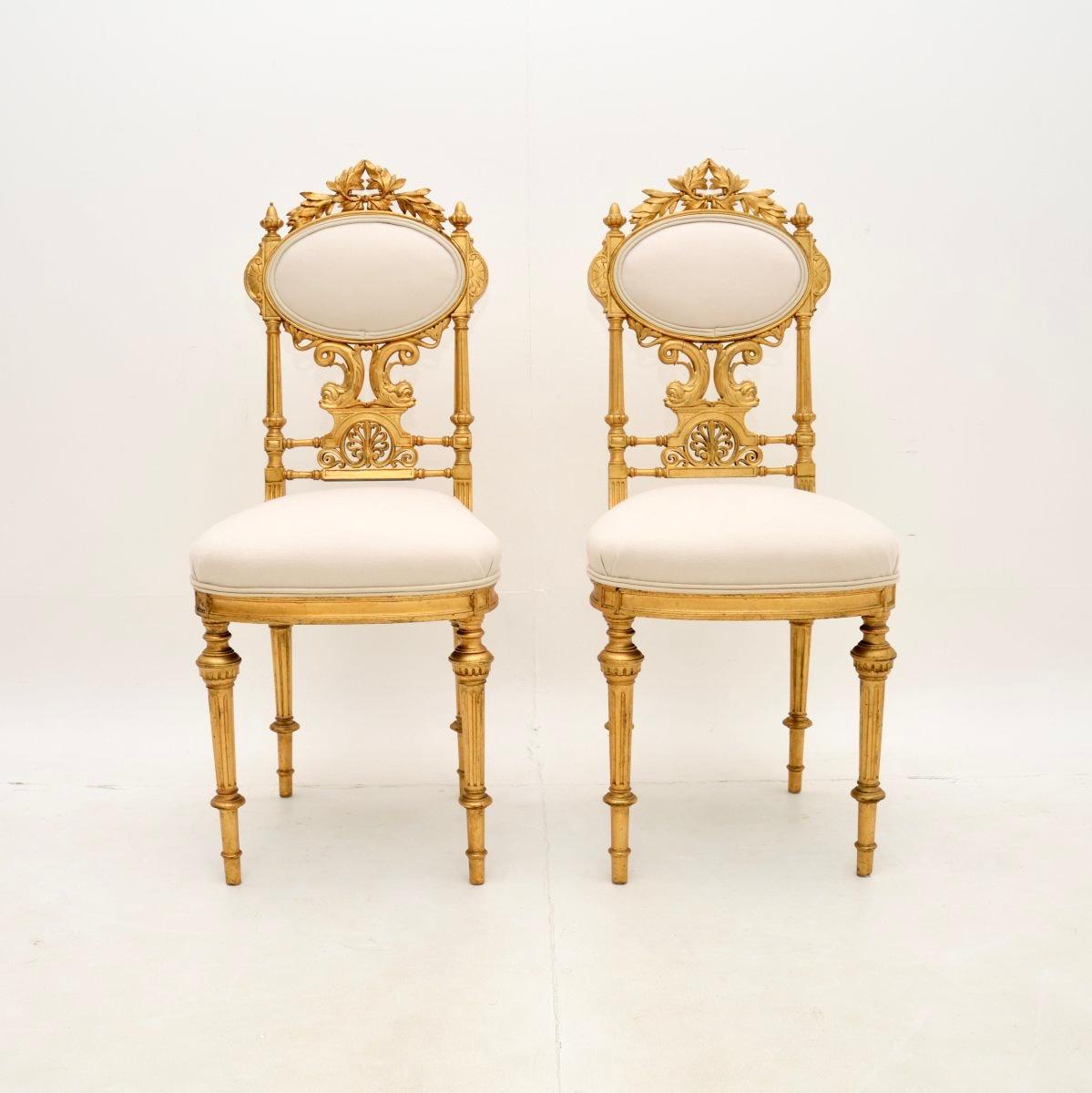 An incredibly beautiful pair of antique Swedish Empire gilt wood side chairs. They were recently imported from Sweden, we would date them to around the 1880-1900 period.

The quality is outstanding, the gilt wood frames have an absolutely stunning