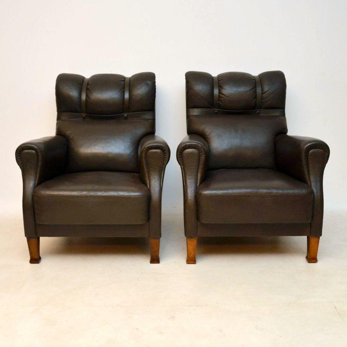 This pair of antique leather Swedish club armchairs have great character and are very comfortable too. The leather is all original along with leather straps and studs. I love the original color on the leather that has naturally aged. The leather is