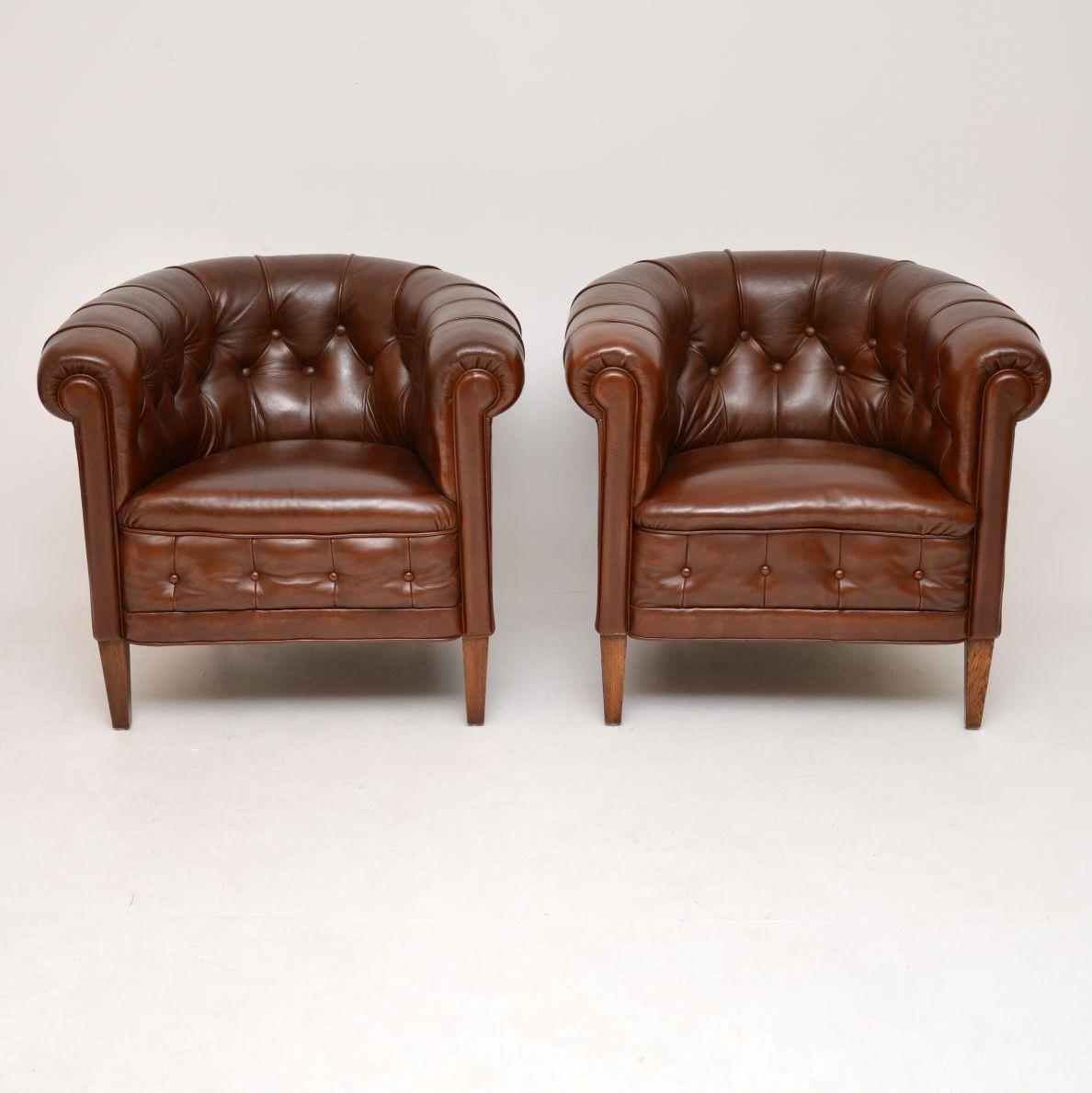 Very comfortable pair of original antique Swedish leather Chesterfield armchairs in fabulous condition and dating to circa 1910 period. They have generous proportions with deep buttoning on the backs and along the bottom front edge. The seats have