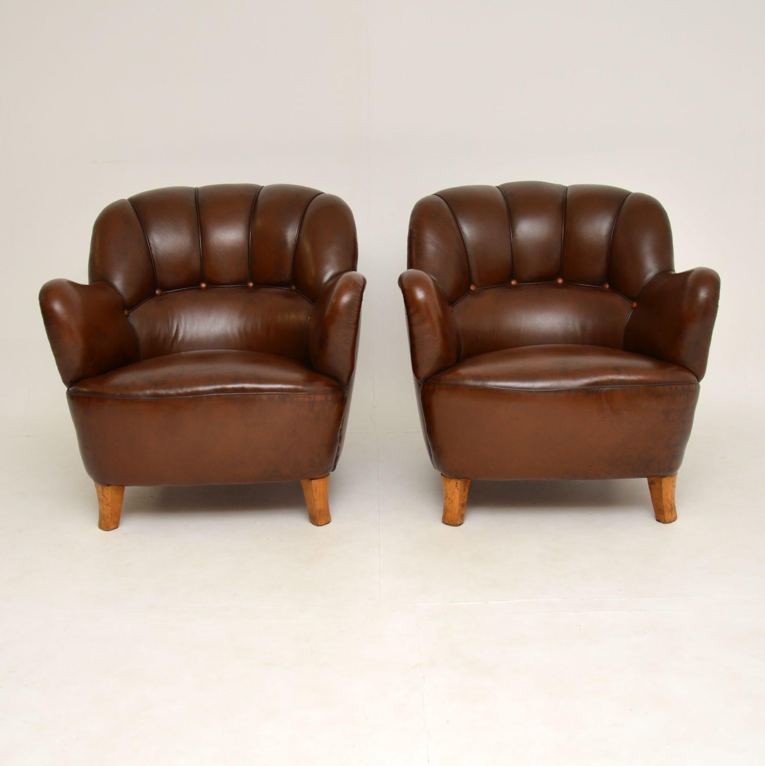 A stunning and extremely comfortable pair of antique leather and satin birch armchairs. These were made in Sweden, they date from circa 1900-1920 period.

They were re-upholstered in high quality leather fairly recently by the previous owners, we