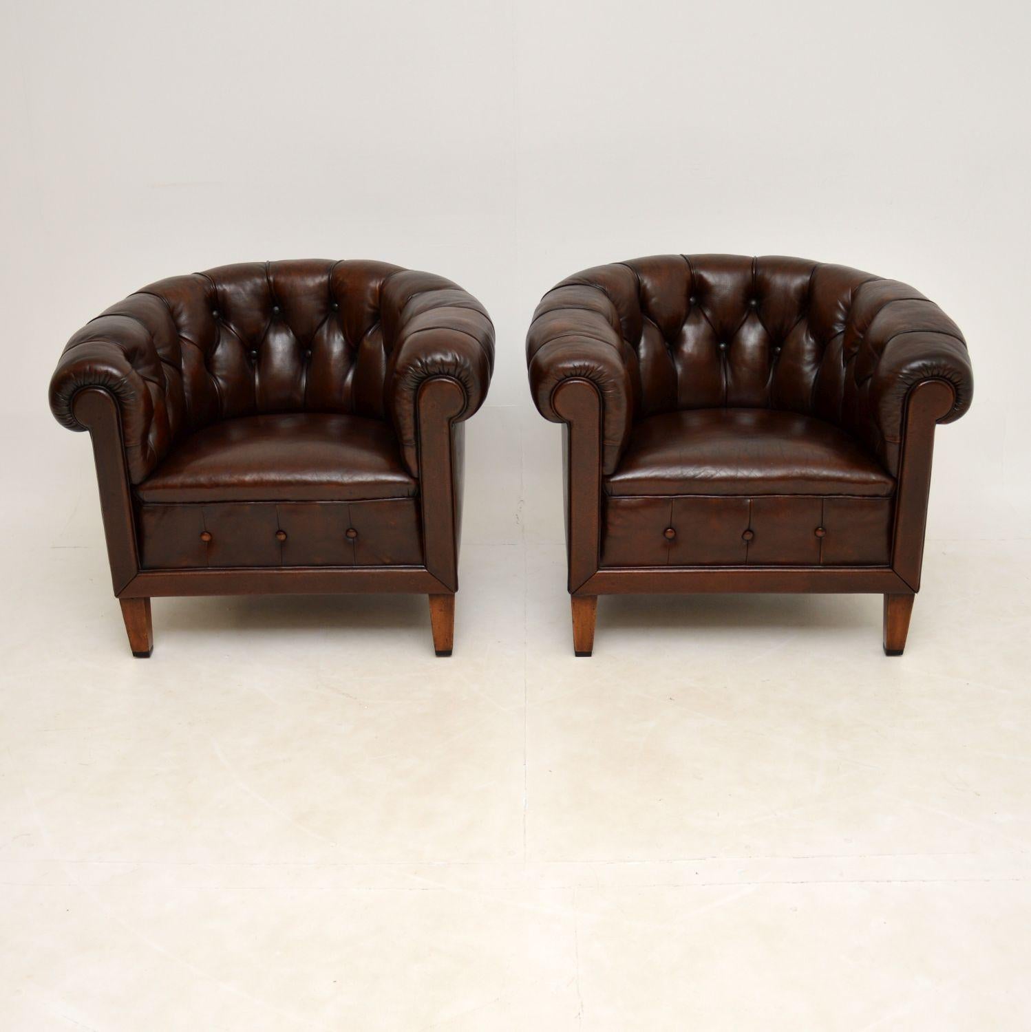 A stunning pair of antique deep buttoned leather Chesterfield armchairs. These were made in Sweden, they date from around the 1900-1910 period.

They are of magnificent quality, with a solid build and beautiful leather upholstery. They are sturdy,