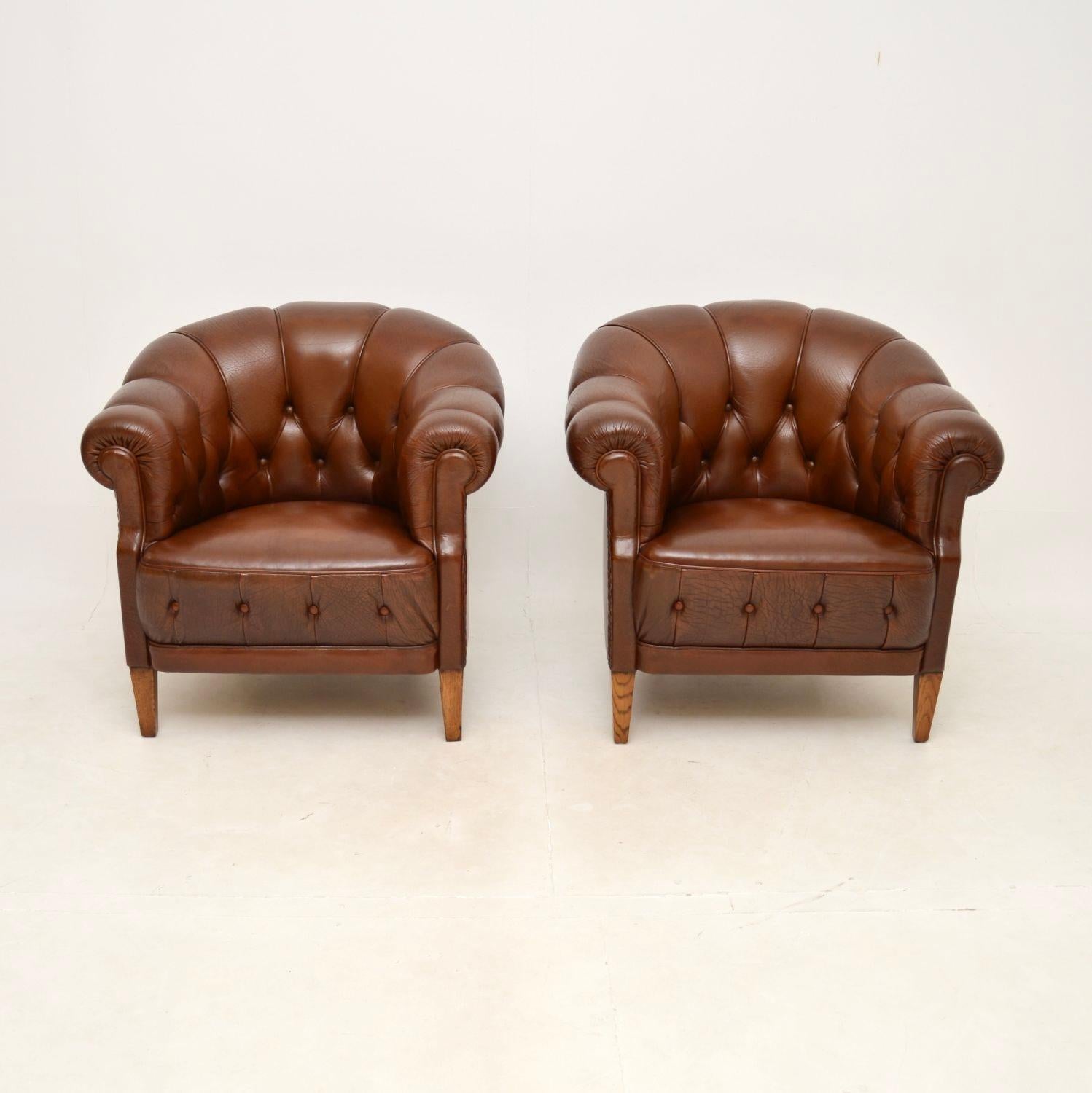 A fantastic pair of antique Swedish leather club armchairs. They were recently imported from Sweden, they date from around the 1950’s.

The quality is outstanding, they are extremely well made and comfortable. The leather is beautiful and thick,